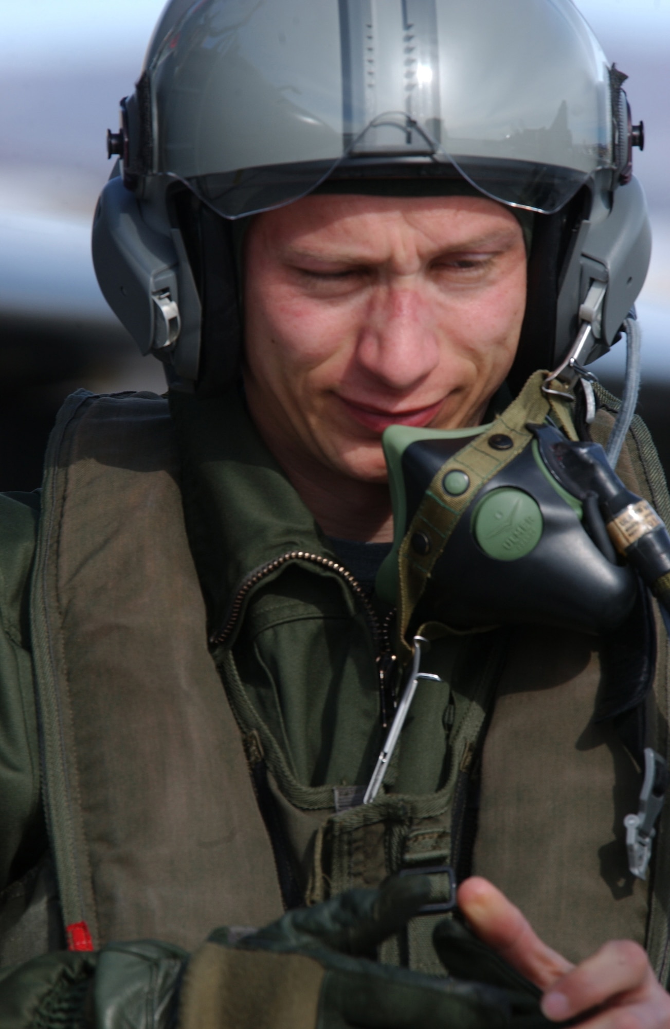 EIELSON AIR FORCE BASE, Alaska -- 2nd Lt. Zemauli Olivier, Armee de l'Air (French Air Force), decends from a Mirage 2000 and is exhausted after finishing a training mission on April 6 during Red Flag-Alaska 07-1. This exercise provides unique opportunities to help integrate various forces into joint, coalition, and bilateral training from simulated forward operating bases. (U.S. Air Force Photo by Airman 1st Class Jonathan Snyder)