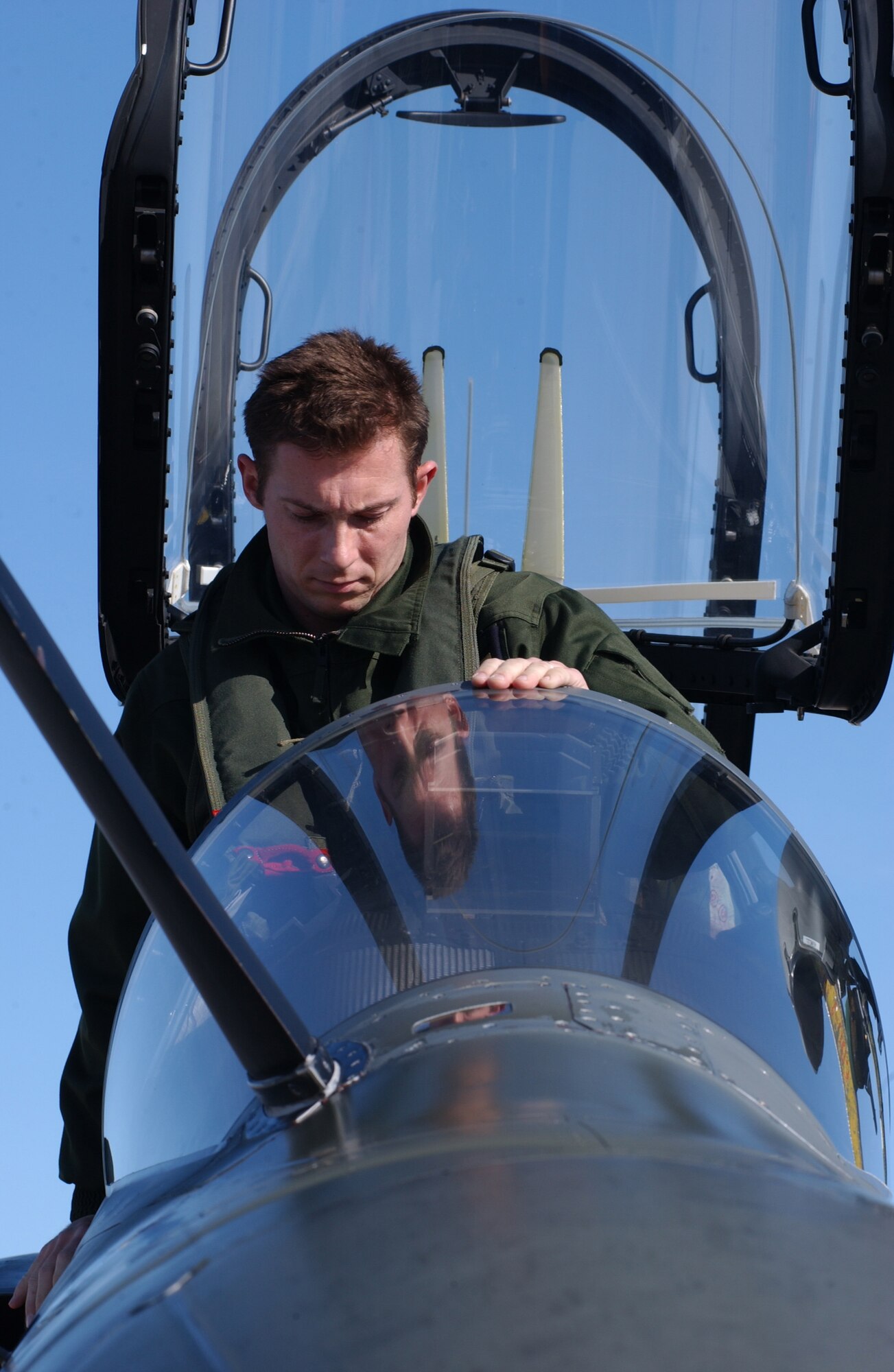 EIELSON AIR FORCE BASE, Alaska -- Capt. Laurens, Armee de l'Air (French Air Force), steps into a Mirage 2000 in front of the Thunderdome on April 6 for Red Flag-Alaska 07-1. This exercise enables aviation units to sharpen their combat skills by flying ten simulated combat sorties in a realistic threat environment.  (U.S. Air Force Photo by Airman 1st Class Jonathan Snyder) (Released)