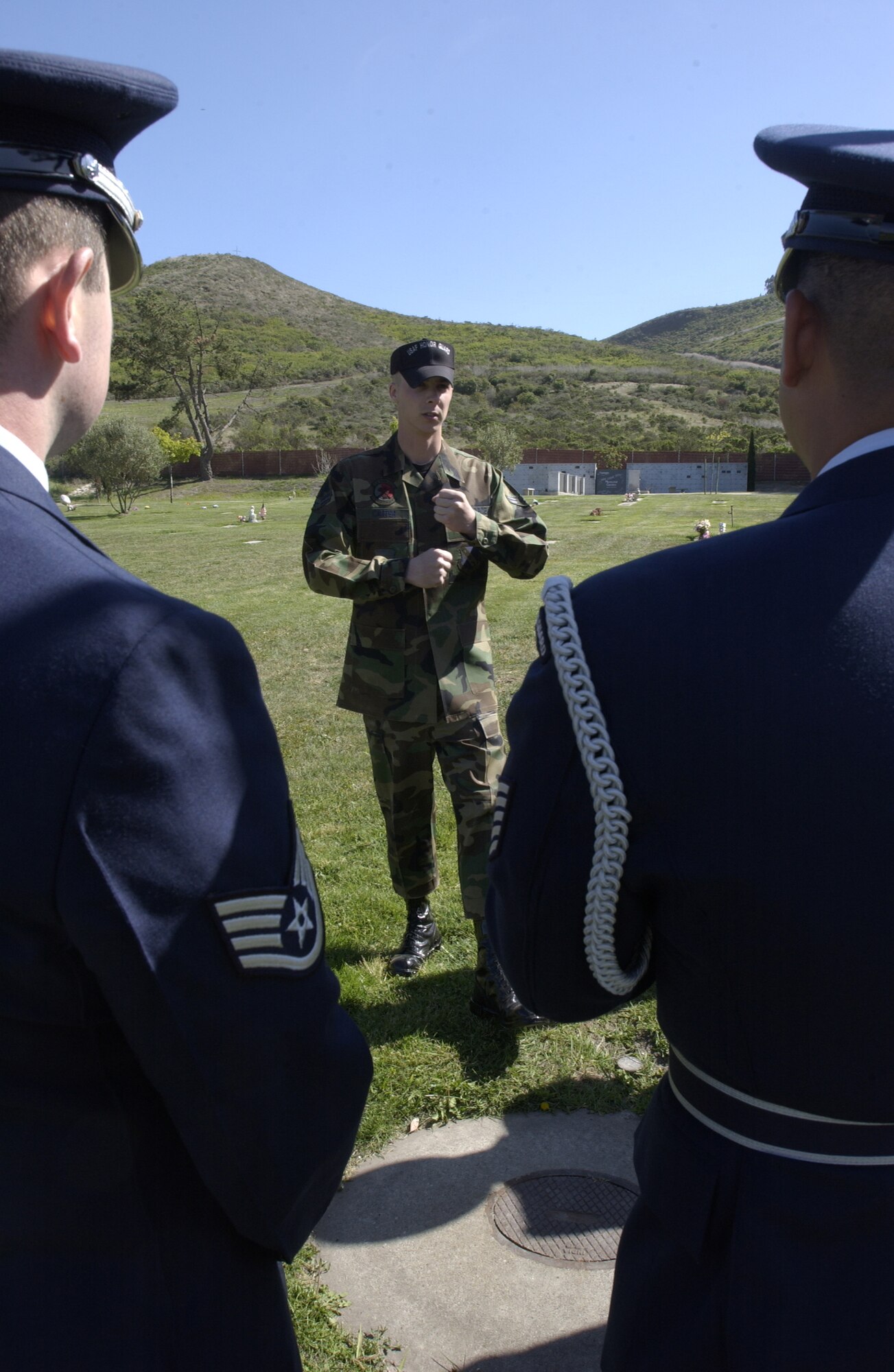 Airman 1st Class Lyle Carter critiques and instructs Vandenberg’s Honor Guardsmen during a mock military funeral at the Lompoc Cemetery April 3, the final scenario in an extensive, eight-day training. Here to train Vandenberg’s Honor Guardsmen, Airman Carter is a formal training instructor and military training leader instructor and part of the Mobile Training Team from Bolling Air Force Base, Washington, D.C., a unit of the Air Force Honor Guard. (Photo by Staff Sgt. Christina Rumsey)