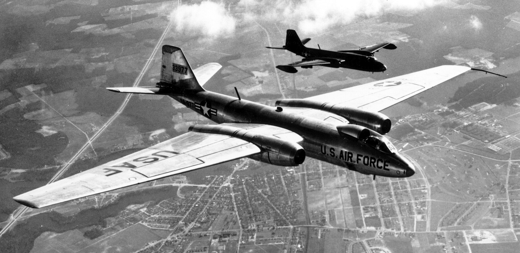 (Atomic Flyer) Cloud Samplers Head for ?Rock?April 4, 1958The 4926th Test Squadron (Sampling), winner of the Air Force Special Weapons Center  1957 annual flying safety award, left here Tuesday morning for the 5,000-mile flight to Eniwetok, Marshall Islands,  and this year?s overseas nuclear weapons test series.The squadron, flying B-57s, is the last major Kirtland contingent to leave for Operation Hardtack, scheduled to start this month.Families and friends were on hand to see 10 twin ? jet bombers take off in two flights of five each.  The planes, equipped with long-distance fuel tanks, will stop in California, Hawaii, and Johnson Island on their way to the ?Rock.? (U.S. Air Force photo)377th Combat Support Group stands upApril 8, 1966The 377th Combat Support Group, fore-runner to the 377th Air Base Wing, was activated and organized at Tan Son Nhut Air Base, South Vietnam.
