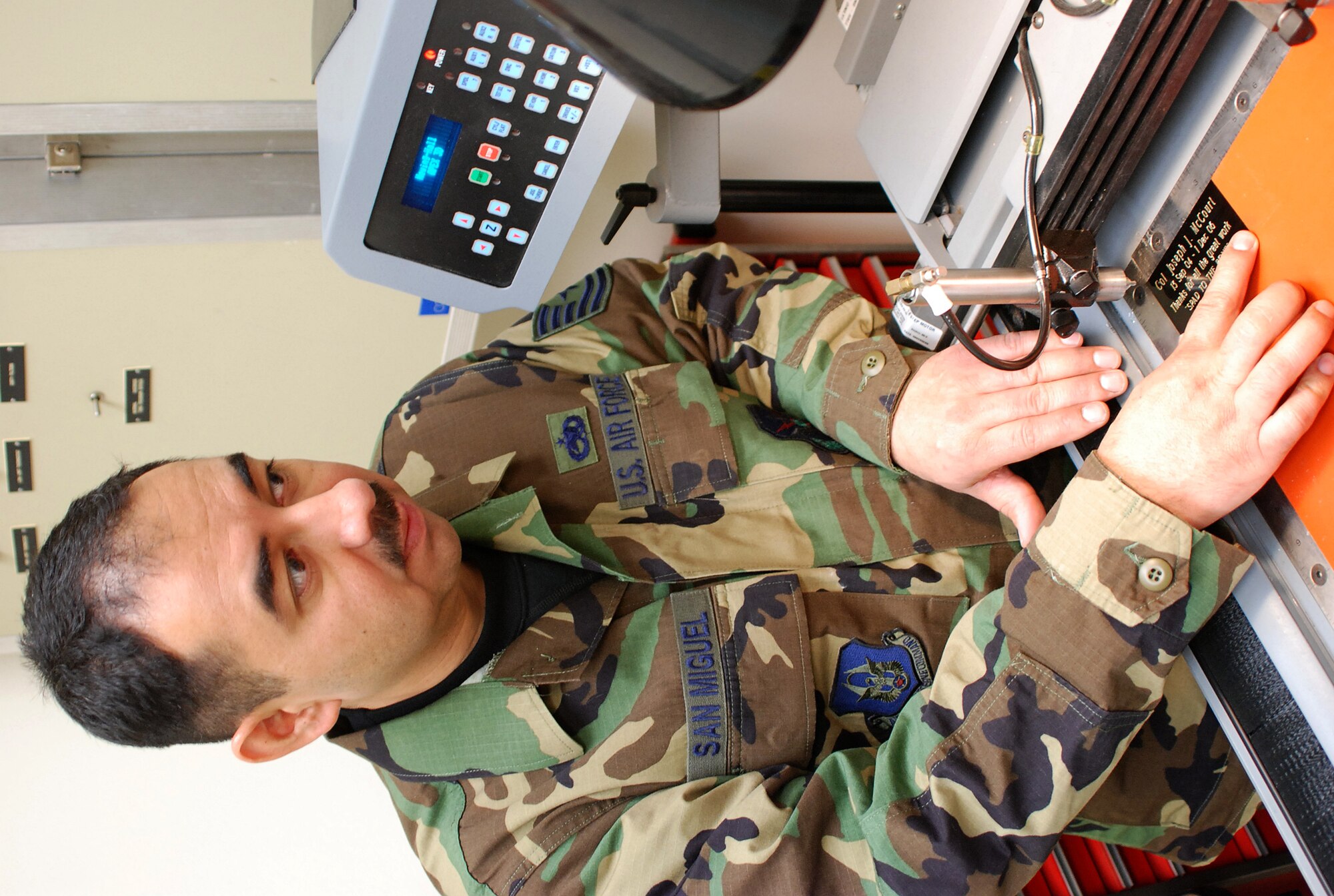 Air Force Reserve Tech. Sgt. Jesus San Miguel of the Aircraft Structural  Shop engraves a metal plate for the 301 Fighter Wing's awards program. There are 69 fonts and symbols available for engraving projects instead of out-soursing the work, engravings done in-house save the 301st Fighter Wing thousands of dollars each year. (U.S. Air Force Photo/Tech. Sgt. Stephen Bailey)
