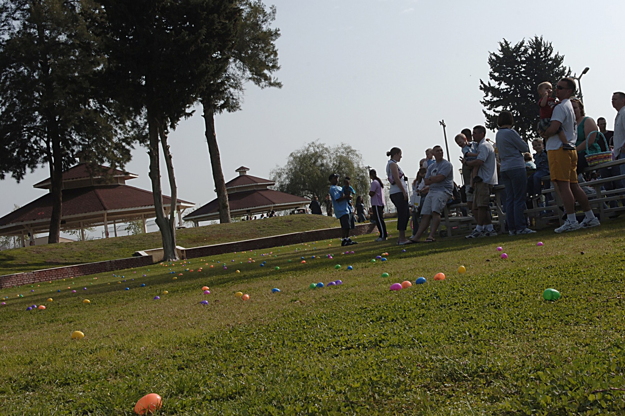 Thousands of Easter Eggs blanketed Arkadas Park Saturday morning as members of team Incirlik and their families came together to join in the Easter Festivities April 7.  The event which was put together by members of the youth center included an egg hunt, games, music, face painting, and crafts for the kids.  The Easter Bunny also made an appearance to hand out Easter eggs, and to take photos with children and adults.  (U. S. Air Force photo by Airman 1st Class Nathan W. Lipscomb)