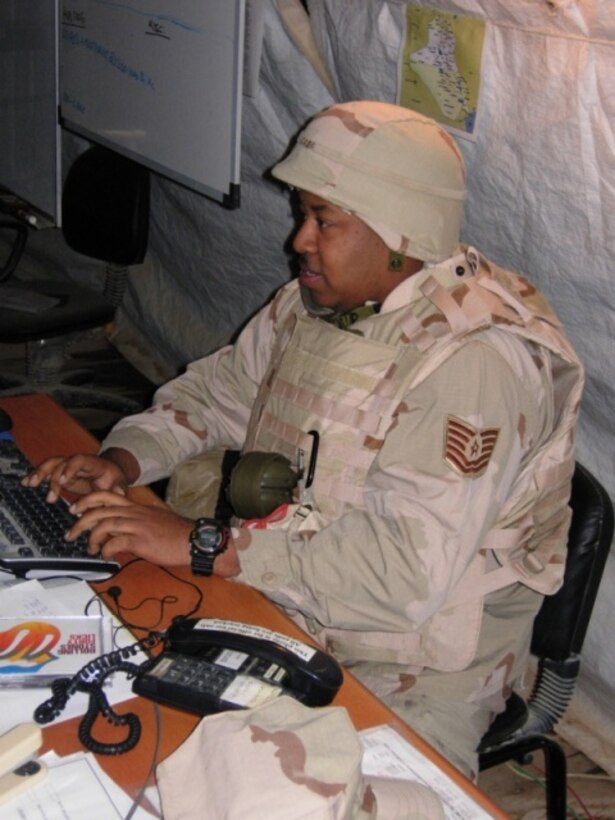 Tech. Sgt. Robert Cade, 44 APS, works on the GATES system to verify flight information while deployed to Tall Afar, Iraq. (Courtesy photo)