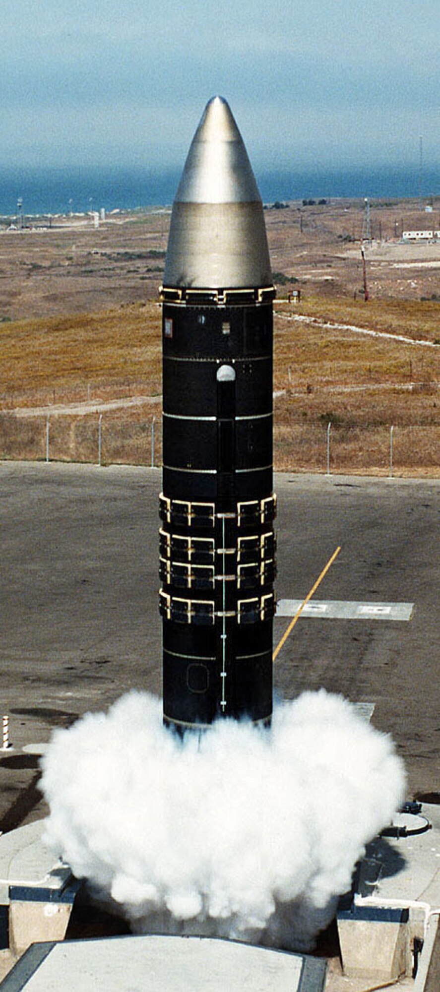A Peacekeeper missile is launched from a silo during a test. Over the next year, the Nuclear Weapons Center will work to integrate weapons program management and intercontinental ballistic missile acquisition and sustainment programs into the center. (U.S. Air Force photo)
