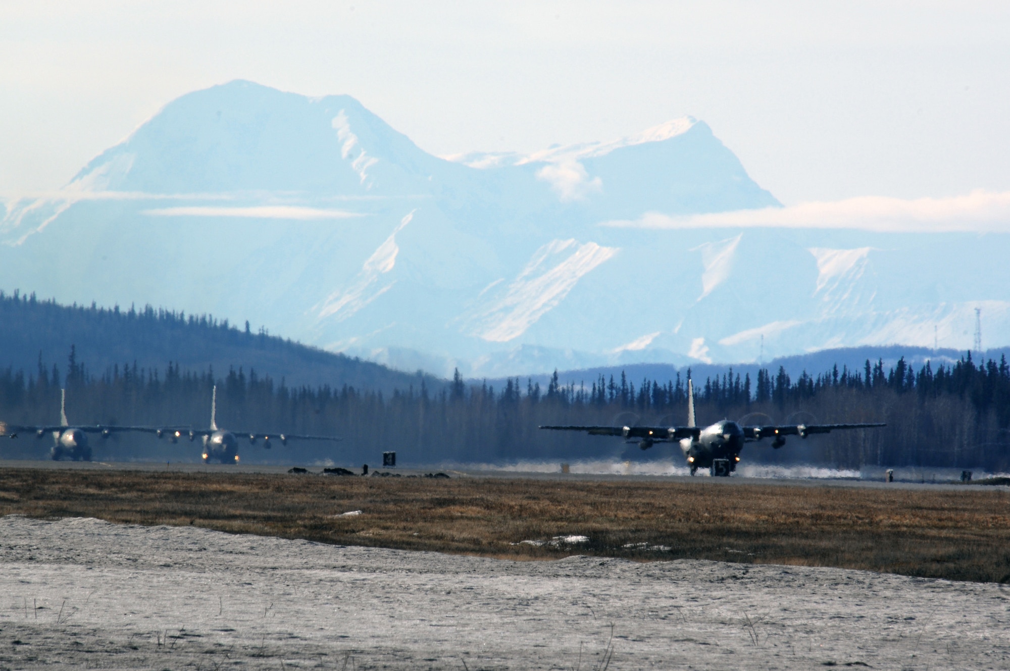 EIELSON AIR FORCE BASE, Alaska -- Two C-130 and one C-160 aircraft from the Armee de l'Air (French Air Force), take off for a mission during Red Flag-Alaska 07-1 here on April 10. Red Flag-Alaska is a Pacific Air Forces-directed field training exercise for U.S. forces flown under simulated air combat conditions. It is conducted on the Pacific Alaskan Range Complex with air operations flown out of Eielson and Elmendorf Air Force Bases.
(U.S. Air Force Photo by Staff Sgt Joshua Strang)