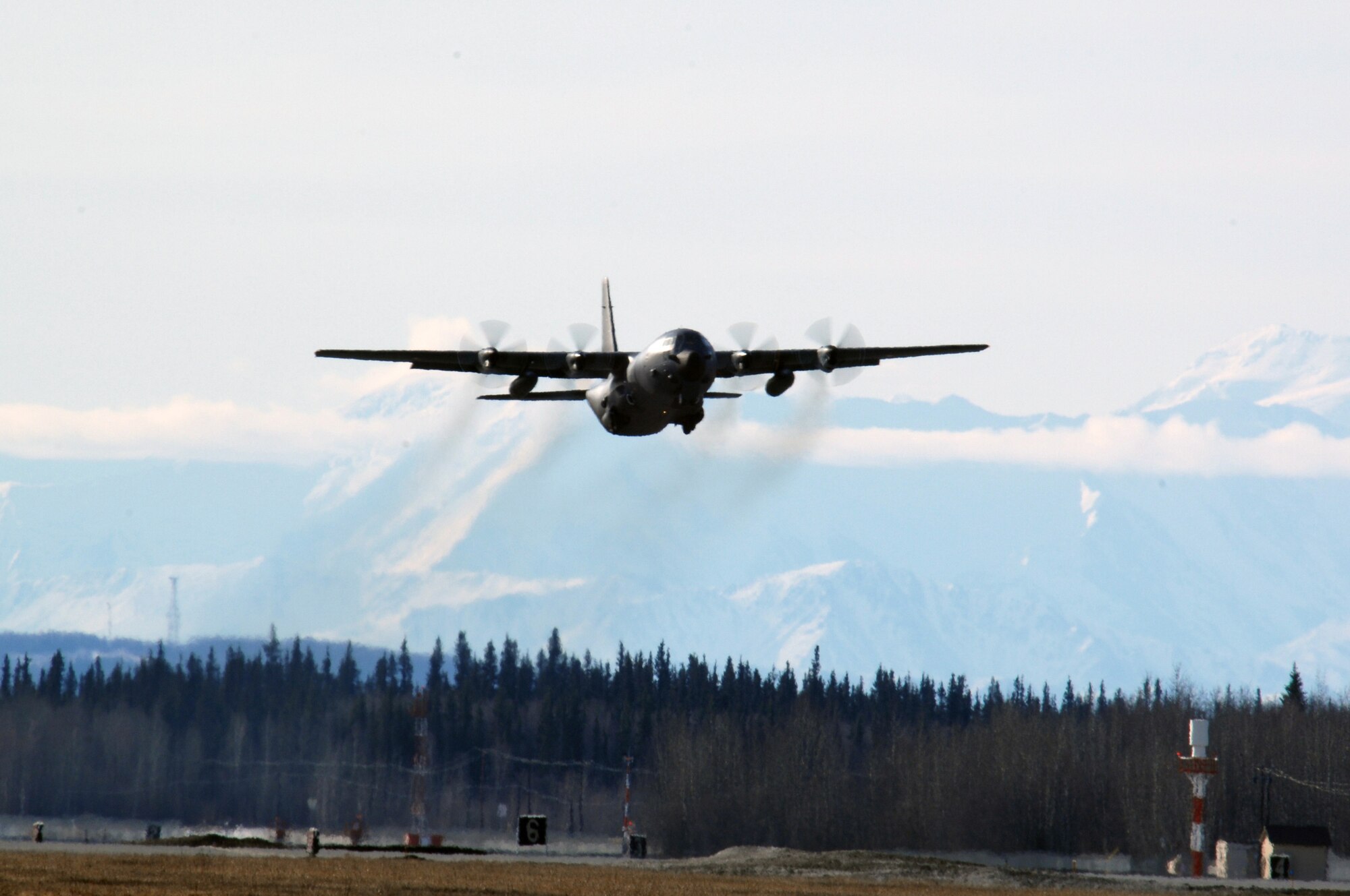 EIELSON AIR FORCE BASE, Alaska -- A French C-130 aircraft from the Armee de l'Air (French Air Force), takes off for a mission during Red Flag-Alaska 07-1 here on April 10. Red Flag-Alaska is a Pacific Air Forces-directed field training exercise for U.S. forces flown under simulated air combat conditions. It is conducted on the Pacific Alaskan Range Complex with air operations flown out of Eielson and Elmendorf Air Force Bases.
(U.S. Air Force Photo by Staff Sgt Joshua Strang)