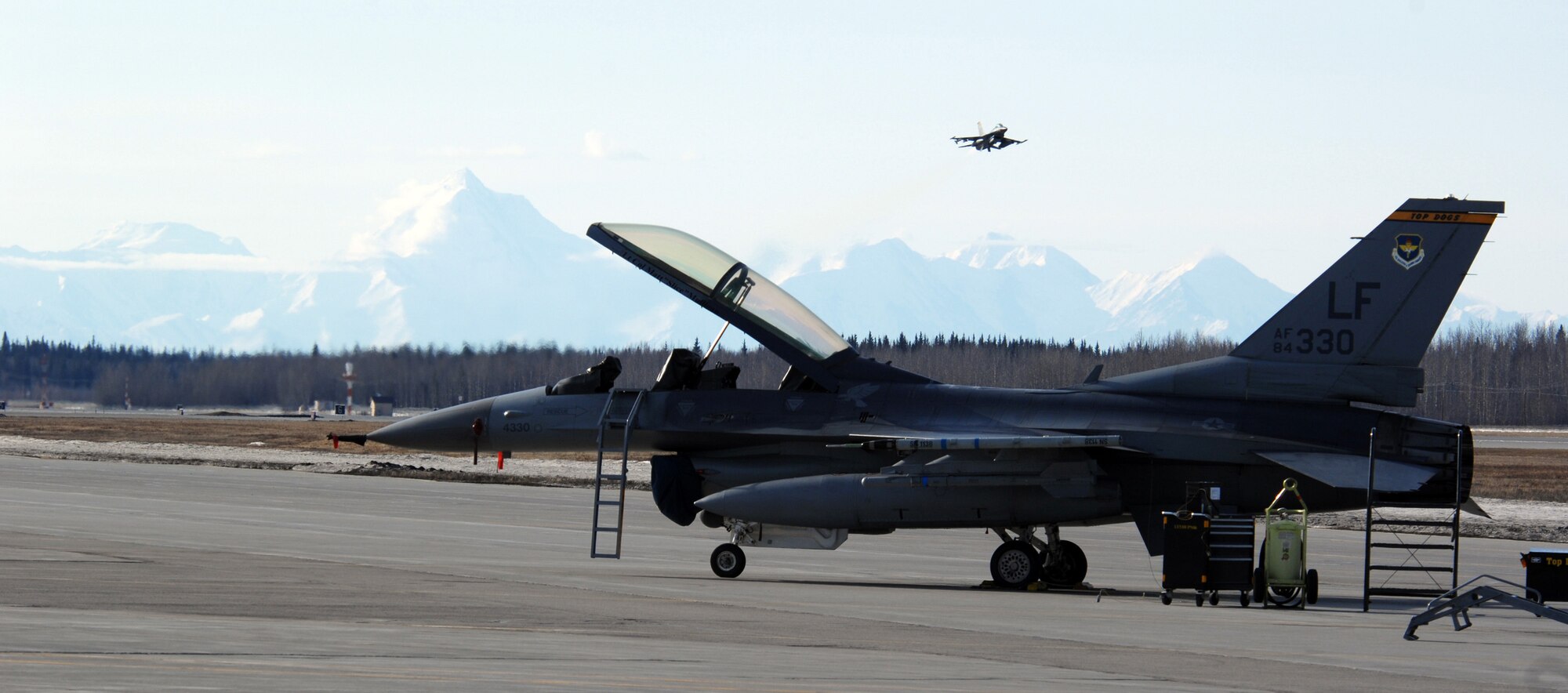 EIELSON AIR FORCE BASE, Alaska -- An F-16 Fighting Falcon from the 61st Fighter Squadron, Luke Air Force Base, Arizona takes off for a mission during Red Flag-Alaska 07-1 here on April 10. Red Flag-Alaska is a Pacific Air Forces-directed field training exercise for U.S. forces flown under simulated air combat conditions. It is conducted on the Pacific Alaskan Range Complex with air operations flown out of Eielson and Elmendorf Air Force Bases. 
(U.S. Air Force Photo by Staff Sgt Joshua Strang) 