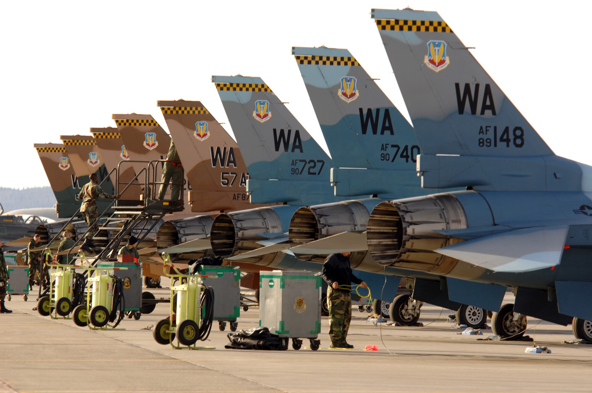 EIELSON AIR FORCE BASE, Alaska -- Tail flashes from the 64th Aggressor Squadron, Nellis Air Force Base, Nevada, F-16 Fighting Falcons are showcased during Red Flag-Alaska 07-1 here on April 10. Red Flag-Alaska is a Pacific Air Forces-directed field training exercise for U.S. forces flown under simulated air combat conditions. It is conducted on the Pacific Alaskan Range Complex with air operations flown out of Eielson and Elmendorf Air Force Bases. 
(U.S. Air Force Photo by Staff Sgt Joshua Strang) 