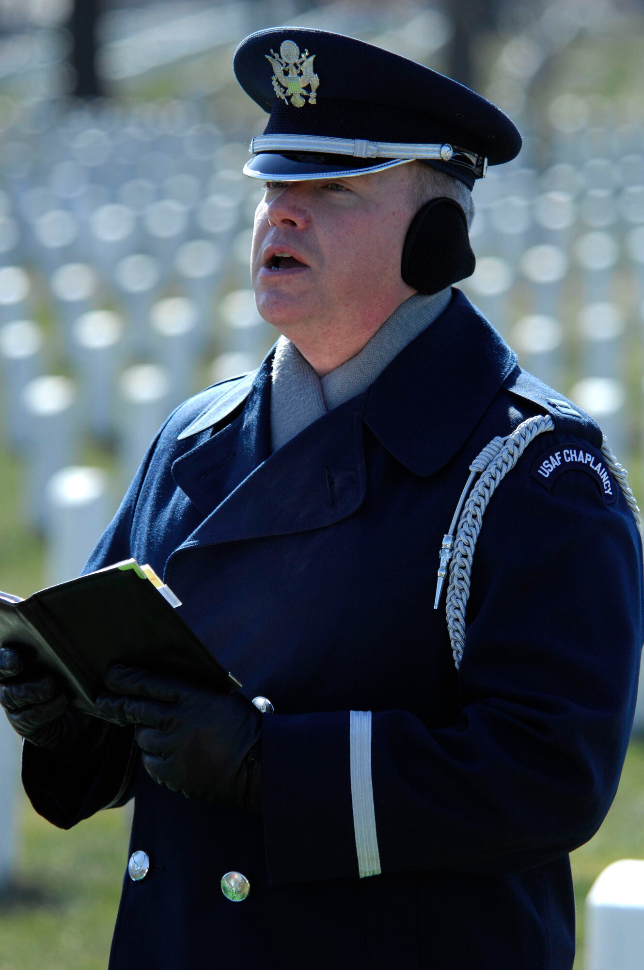 Chaplain (Capt.) Kenneth Fisher is one of three Air Force chaplains assigned to Arlington National Cemetery to preside over funerals for Air Force members to be buried there.  Each of the services has chaplains assigned and collectively, they conduct an average of 27 funerals a day.  (U. S. Air Force photo/Tech. Sgt. Cohen A. Young)