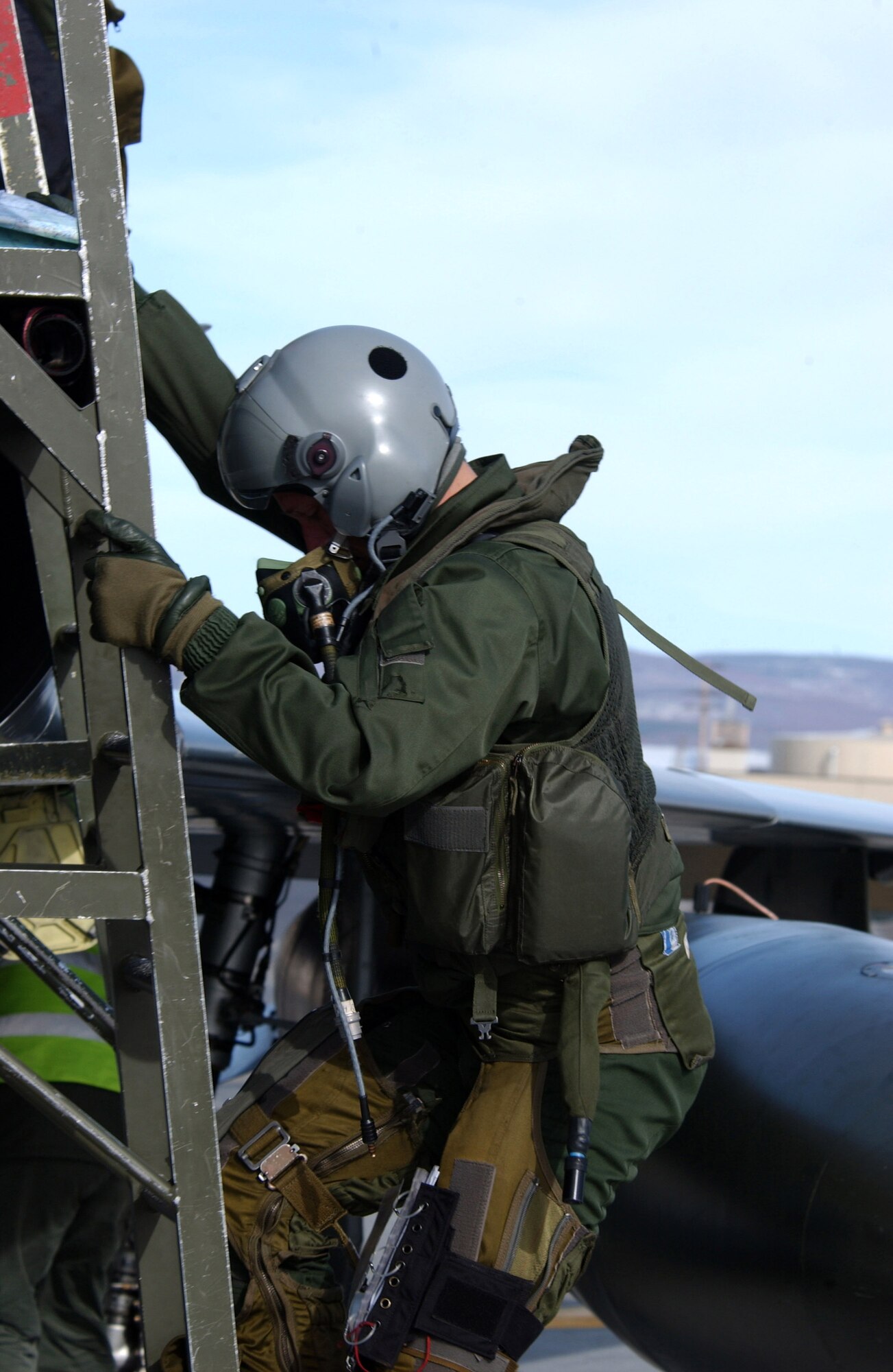 French air force 2nd Lt. Zemauli Olivier decends from a M2000 following a Red Flag-Alaska 07-1 mission April 6 at Eielson Air Force Base, Alaska. This exercise provides unique opportunities to help integrate various forces into joint, coalition and bilateral training from simulated forward operating bases. Red Flag-Alaska is a Pacific Air Forces-directed field training exercise flown under simulated air combat conditions. (U.S. Air Force photo/Airman 1st Class Jonathan Snyder)
