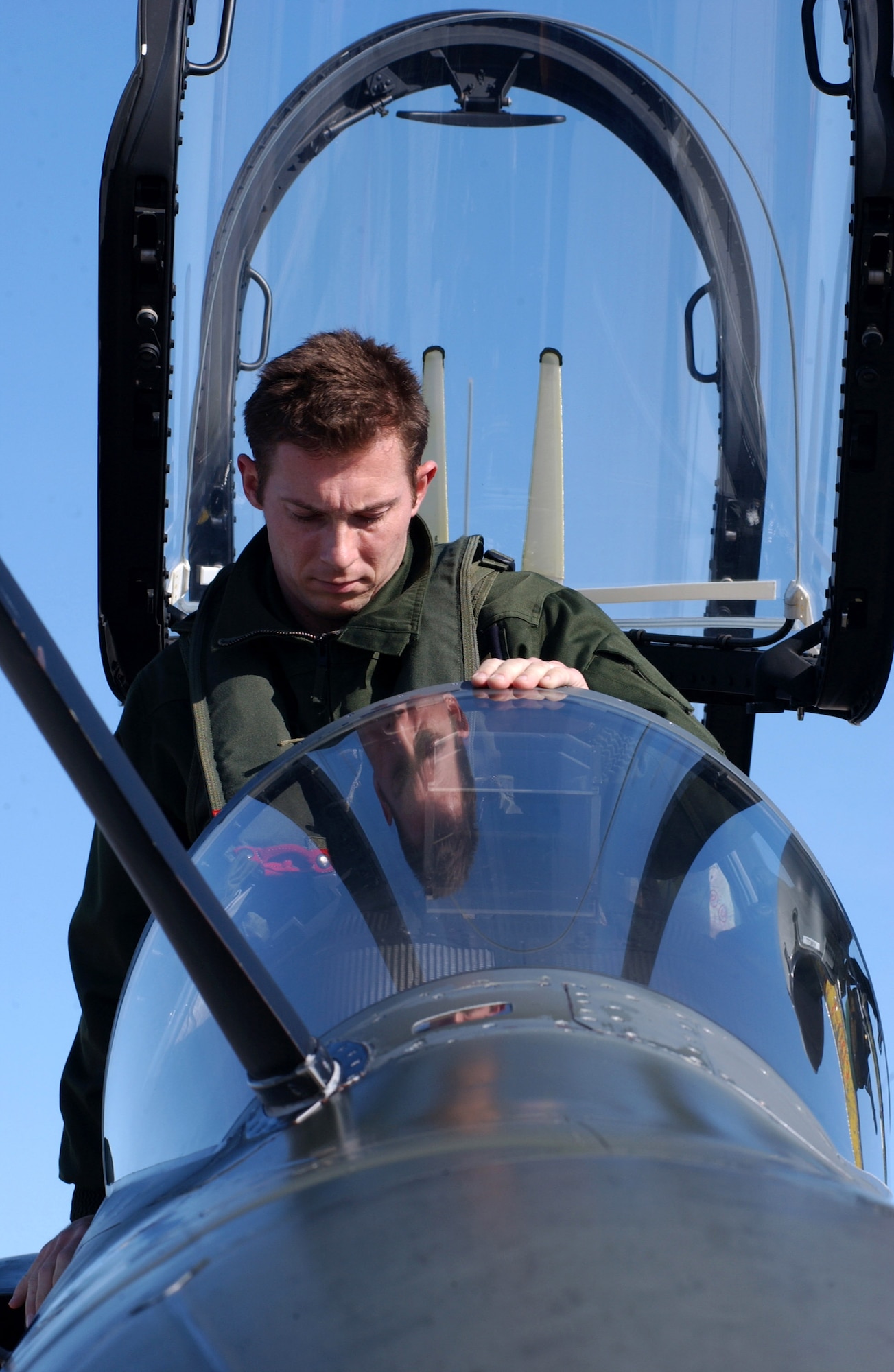 A French air force pilot climbs into the cockpit of a M2000 Mirage for a Red Flag-Alaska 07-1 mission April 6 at Eielson Air Force Base, Alaska. This exercise enables aviation units to sharpen their combat skills by flying 10 simulated combat sorties in a realistic threat environment. It is conducted on the Pacific Alaskan Range Complex with air operations flown out of Eielson and Elmendorf Air Force Bases. (U.S. Air Force photo/Airman 1st Class Jonathan Snyder)
