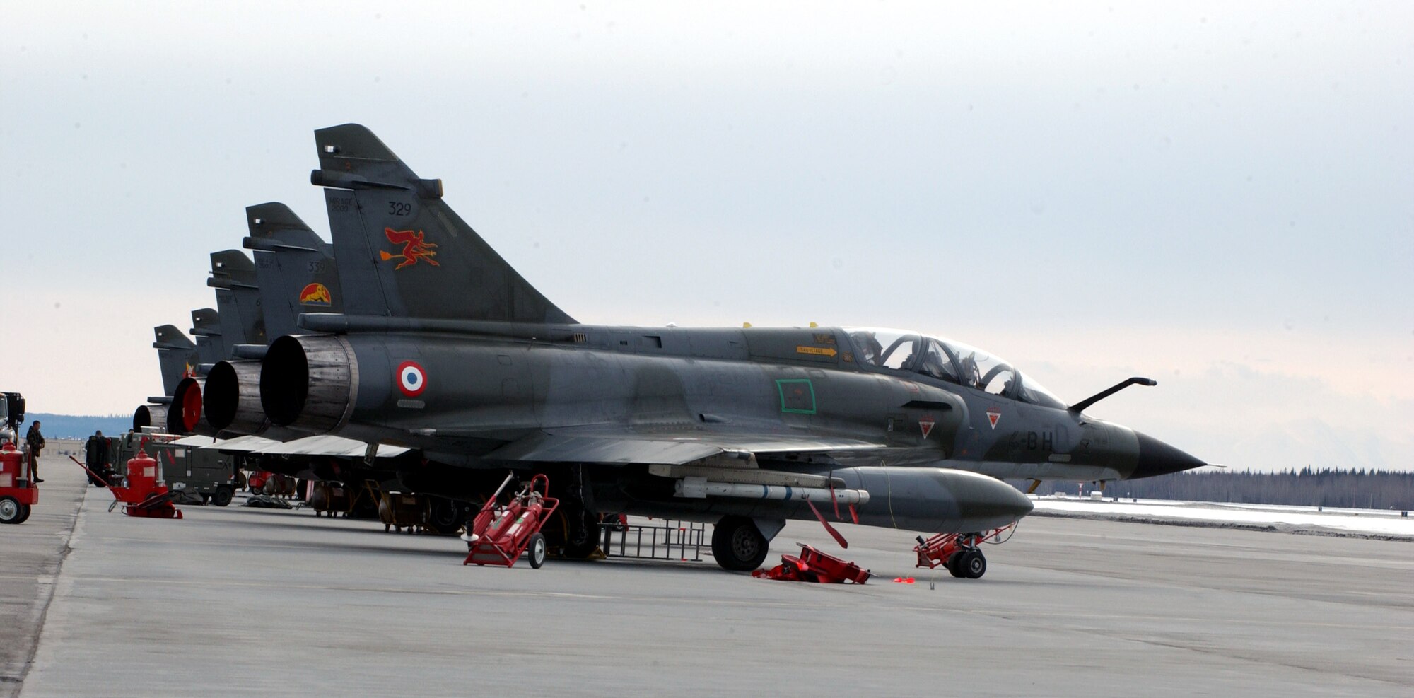 French air force M2000 Mirages await a mission for Red Flag-Alaska 07-1 in April at Eielson Air Force Base, Alaska. Red Flag-Alaska is a Pacific Air Forces-directed field training exercise flown under simulated air combat conditions. It is conducted on the Pacific Alaskan Range Complex with air operations flown out of Eielson and Elmendorf Air Force bases. (U.S. Air Force photo/Airman 1st Class Jonathan Snyder)
