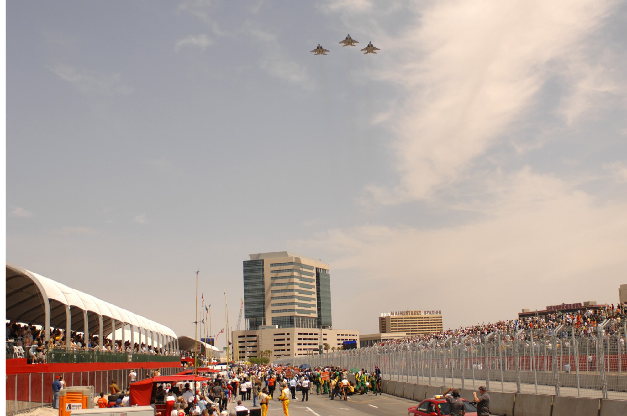 Three F-15s perform a fly by over a crowd at the inaugural Vegas Grand Prix on April 8, 2007. (U.S. Air Force Photo/Senior Airman Jason Huddleston)