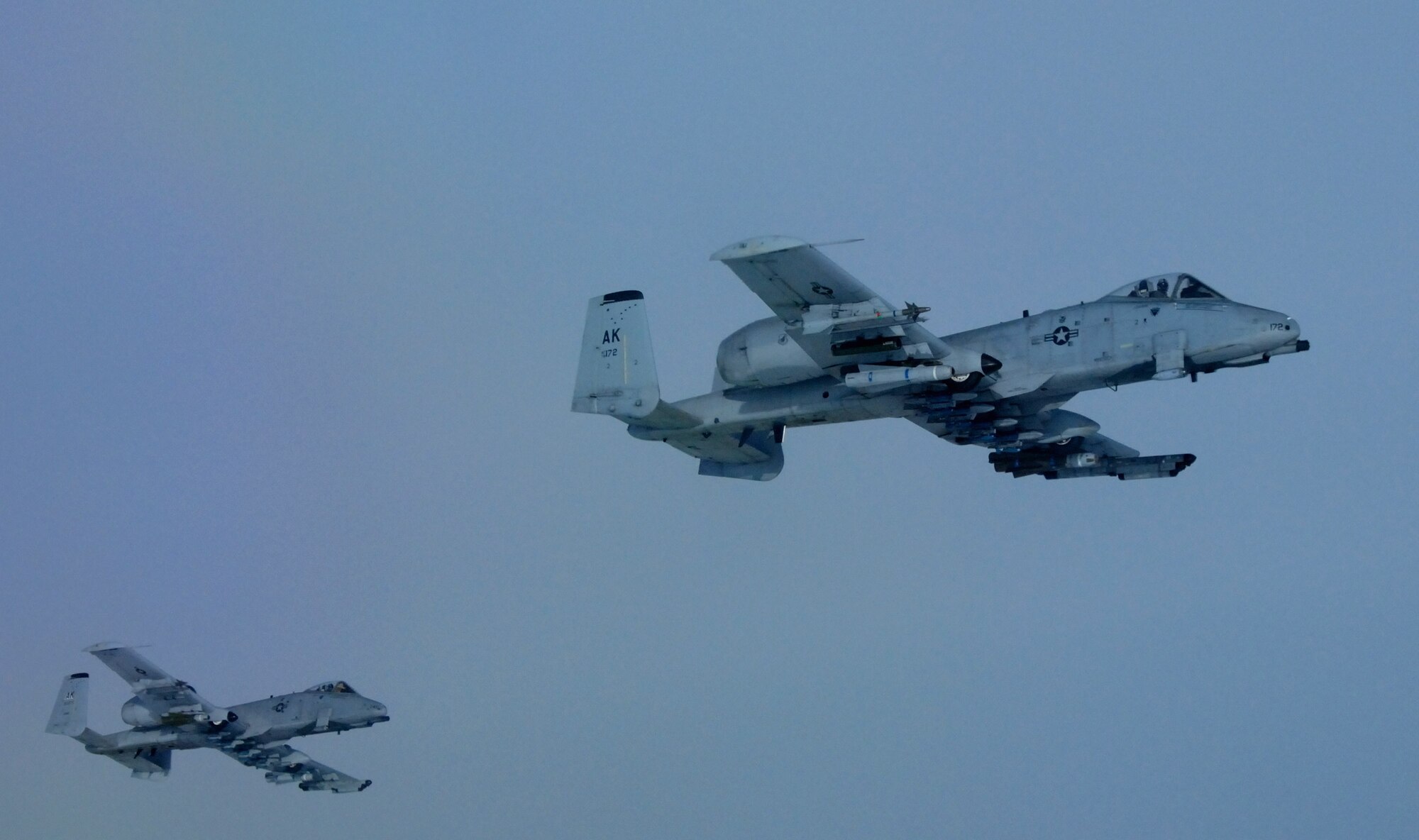 Two A-10 Thunderbolt IIs await refueling from a KC-135 Stratotanker April 4 over the Pacific Alaska Range Complex. The 355th Fighter Squadron, Eielson Air Force Base, Alaska, provides mission ready A-10s and has a search and rescue capability for Alaska and deployed sites worldwide. (U.S. Air Force photo/Master Sgt. Robert Wieland)
