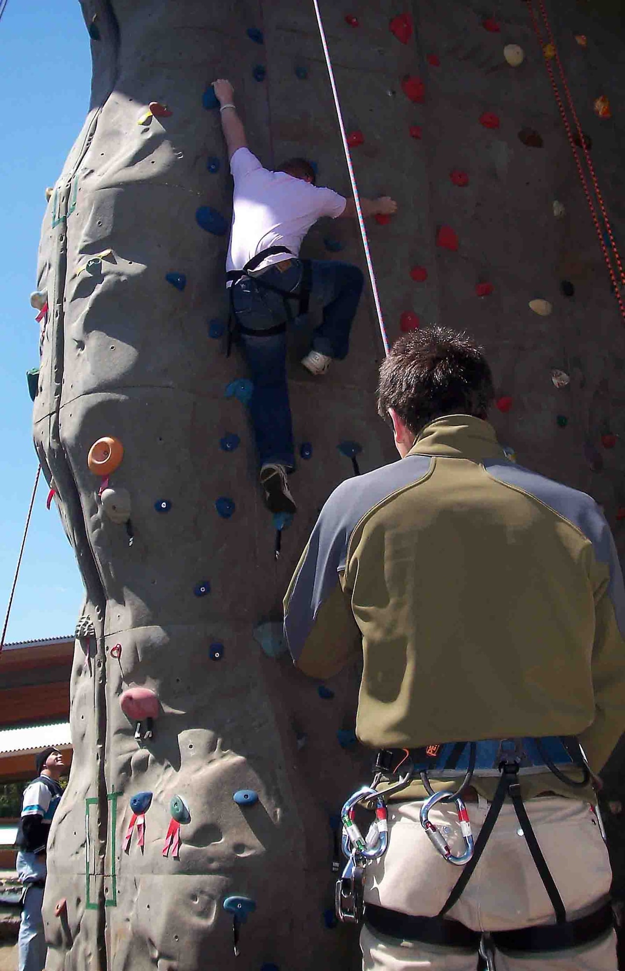 CHARLOTTE, N.C. -- Airman 1st Class Josh Brady, 20th Equipment Maintenance Squadron, climbs his way to the top of the rock while being safely secured by the rock-climbing instructor during a rock climbing excursion April 7 at the U.S. National Whitewater Center in Charlotte, N.C. The day trip, which was hosted by Shaw Air Force Base's outdoor recreation center, cost $25 per Airman and included transportation, whitewater rafting as well as rock climbing. (U.S. Air Force photo/Senior Airman John Gordinier)