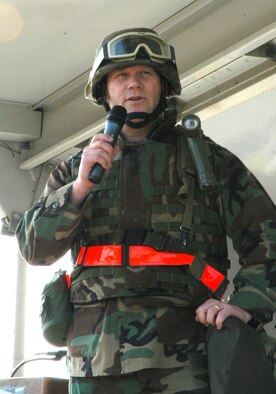 KUNSAN AIR BASE, Republic of Korea  April 6, 2007 -- Col. Jeff "Wolf" Lofgren, 8th Fighter Wing commander, talks to wing Airmen April 6 about April's upcoming Operational Readiness Inspection. The Wolf, together with Chief Master Sgt. Anthony "Wolf Chief" Brinkley, 8th FW command chief, addressed the crowd of more than 1,500 about the stresses and successes the wing has gone through since May 2006. (Air Force photo/Senior Airman Stephen Collier)                                                                