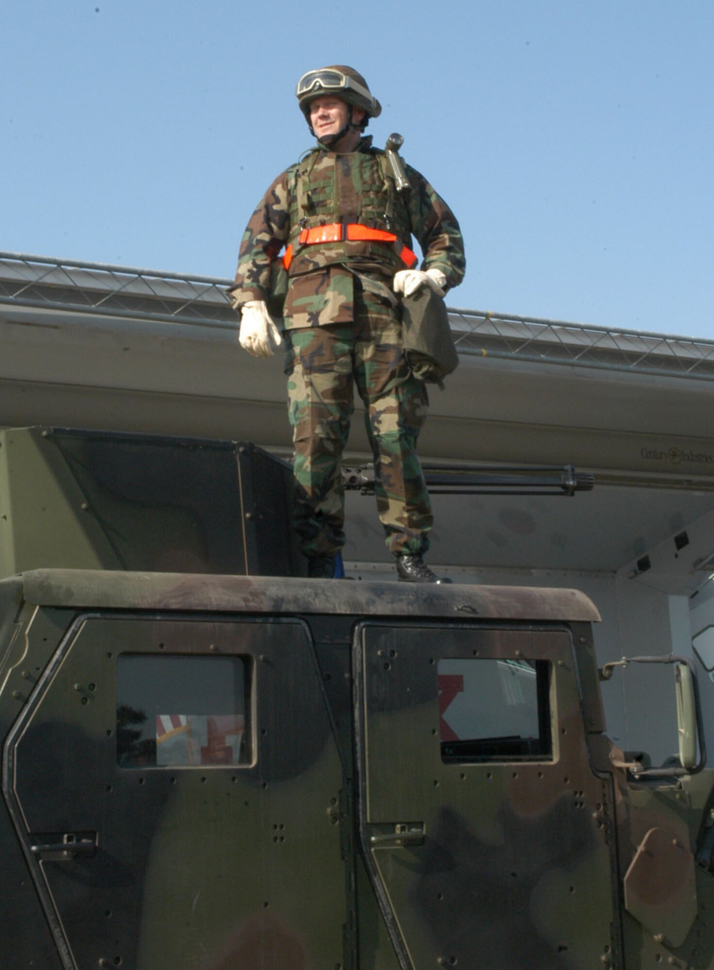 KUNSAN AIR BASE, Republic of Korea  April 6, 2007 -- Col. Jeff 'Wolf' Lofgren, 8th Fighter Wing commander, stands on top a Humvee April 6 as he gave his last 'Wolf Call' to wing Airmen prior to the Operational Readiness Inspection. A Wolf Call, better known as a commanders call, gives the commander the ability to speak to the entire wing at once. (Air Force photo/Senior Airman Stephen Collier)                                