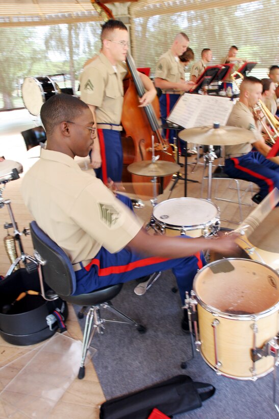 Sergeant Ryan Morris, percussionist, Marforpac Big Band, nails a drum solo during the performance at Kapiolani Park, Honolulu, April 10.  The Big Band performed for the students who competed in the Hawaiian Invitational Musical Festival, which included 1500 students from 15 different high schools from across the country.