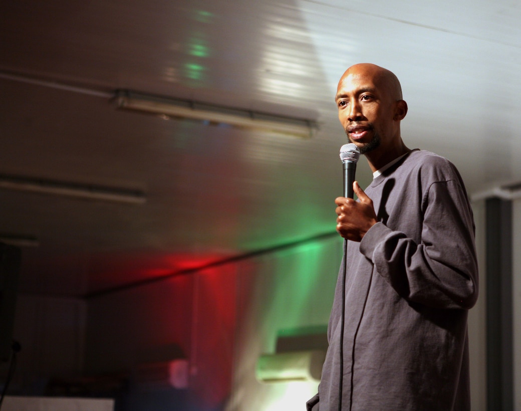 AL ASAD, Iraq --  Tobe Hixx speaks to the audience during the comedy show at the Morale, Welfare and Recreation Center at Al Asad, April 10.  Hixx, along with Jamal Doman and Chris Simpson, went on the tour to raise the morale of troops and help take their mind off being away from home.
