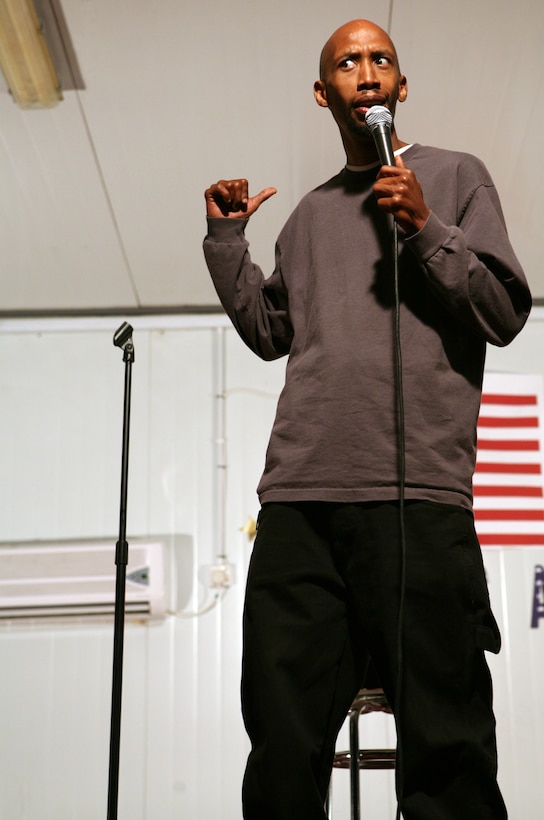 AL ASAD, Iraq --  Comedian Tobe Hixx performs his standup routine at the Al Asad Morale, Welfare and Recreation Center, April 10. Hixx, along with Chris Simpson and Jamal Doman, stopped here during their comedy tour sponsored by AKA Productions.