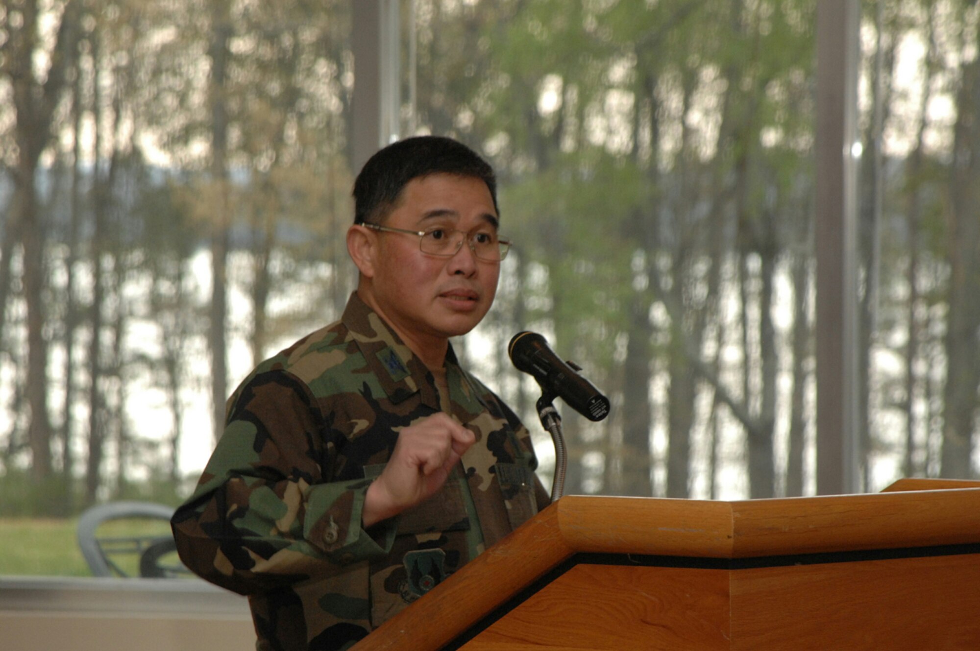 Air Force Materiel Command Chaplain Col. Joseph S. Kuan urges those attending the National Prayer Breakfast at Arnold Air Force Base, Tenn., Tues., April 10 to be good role models of spiritual wellness and be receptive to the overall well-being of coworkers. (Photo by David Housch)
