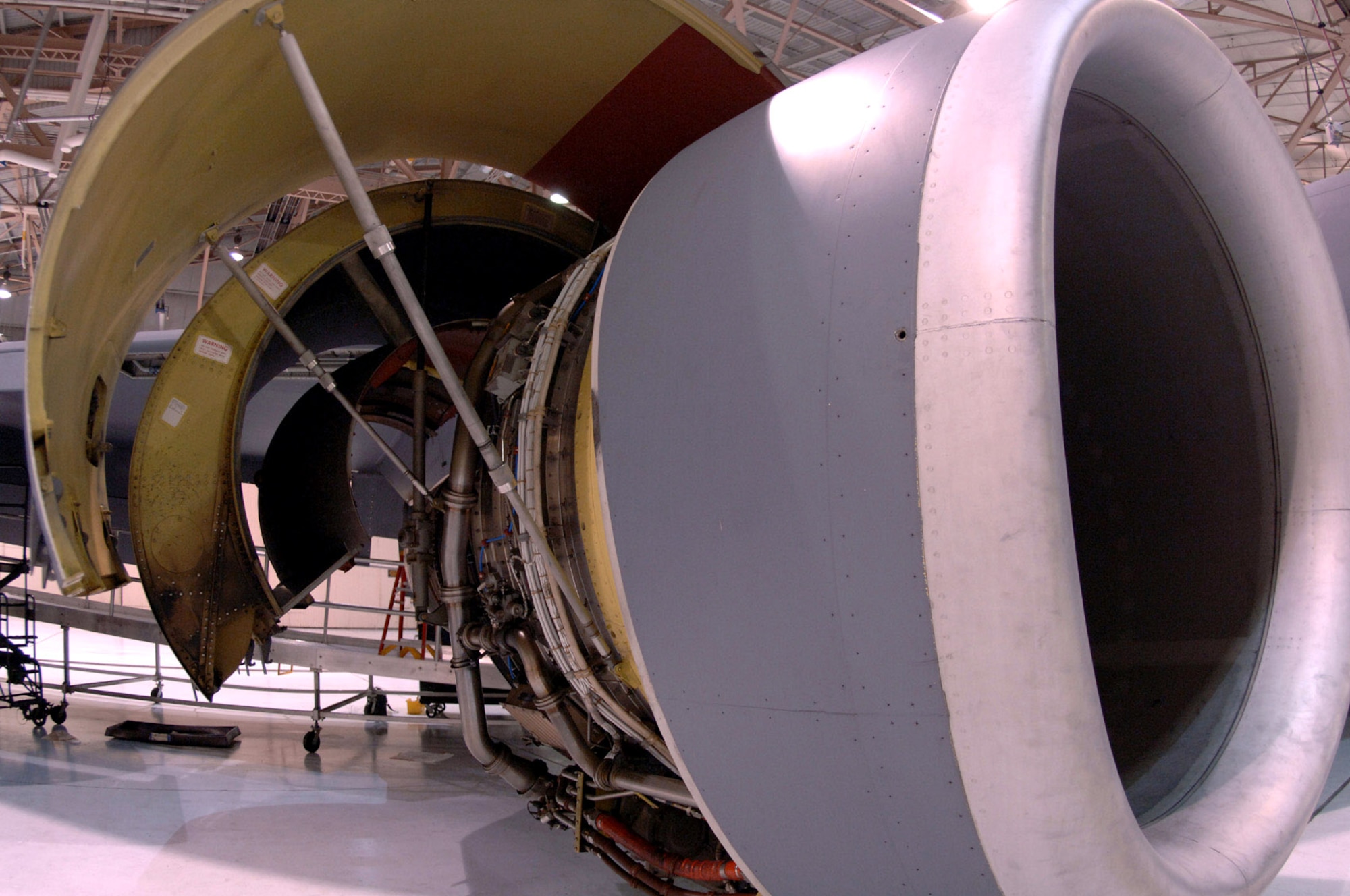 One of four KC-135 Stratotanker engines sits with its cowlings open and ready for inspection during a periodic inspection at Grand Forks Air Force Base, N.D. The engines are just one of many systems examined during these inspections. More than eight career fields and 50 Airmen work together to ensure the almost 50-year-old backbone of the Air Force's global reach ability is ready for service throughout the world. (U.S. Air Force photo/Airman 1st Class Chad Kellum) 
