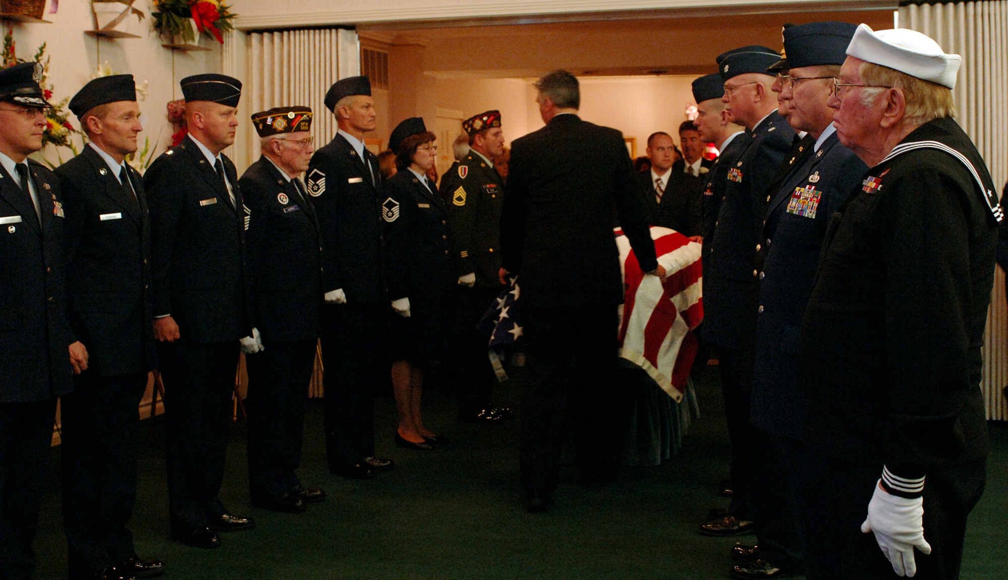 (March 28, 2007, Logan, Utah), Veterans from VFW Post1695, the VFW Post 8307 and active duty military members attending Lt. Colonel Chase J. Nielsen memorial service pay their final respects to one of Utah’s most famous WWII veteran and hero.  Lt. Col Nielsen was one of the last remaining members of the famed “Doolittle Raiders”. The members of the “Doolittle Raiders” reached national acclaim in 1942 after launching the first successful aerial bombing raid on Tokyo, Japan in retaliation for the Japanese bombing of Pearl Harbor, Hawaii in December of 1941. (USAF Photo by Efrain Gonzalez, 75 Communications Squadron)