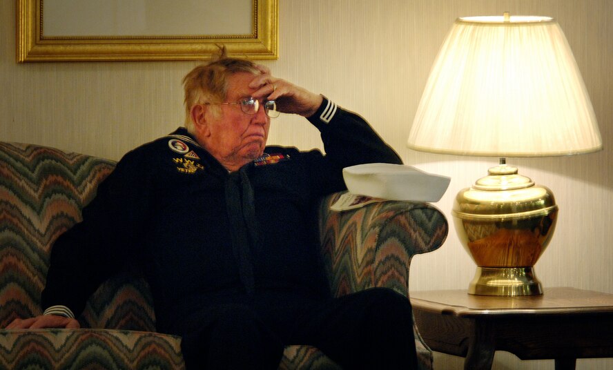 (March 28, 2007, Logan, Utah), Willie Hunsaker, retired US Navy SEABEE and member of the VFW Post 1695 from Brigham City, Utah, mourns the loss of Lt. Colonel Chase J. Nielsen, Utah’s most famous WWII veteran and hero. Lt. Colonel Nielsen was more than a hero to the members of VFW Post 1695; he was also a long time member of their post and a beloved friend.  Lt. Col Nielsen was one of the last remaining members of the famed “Doolittle Raiders”. The members of the “Doolittle Raiders” reached national acclaim in 1942 after launching the first successful aerial bombing raid on Tokyo, Japan in retaliation for the Japanese bombing of Pearl Harbor, Hawaii in December of 1941. (USAF Photo by Efrain Gonzalez, 75 Communications Squadron)