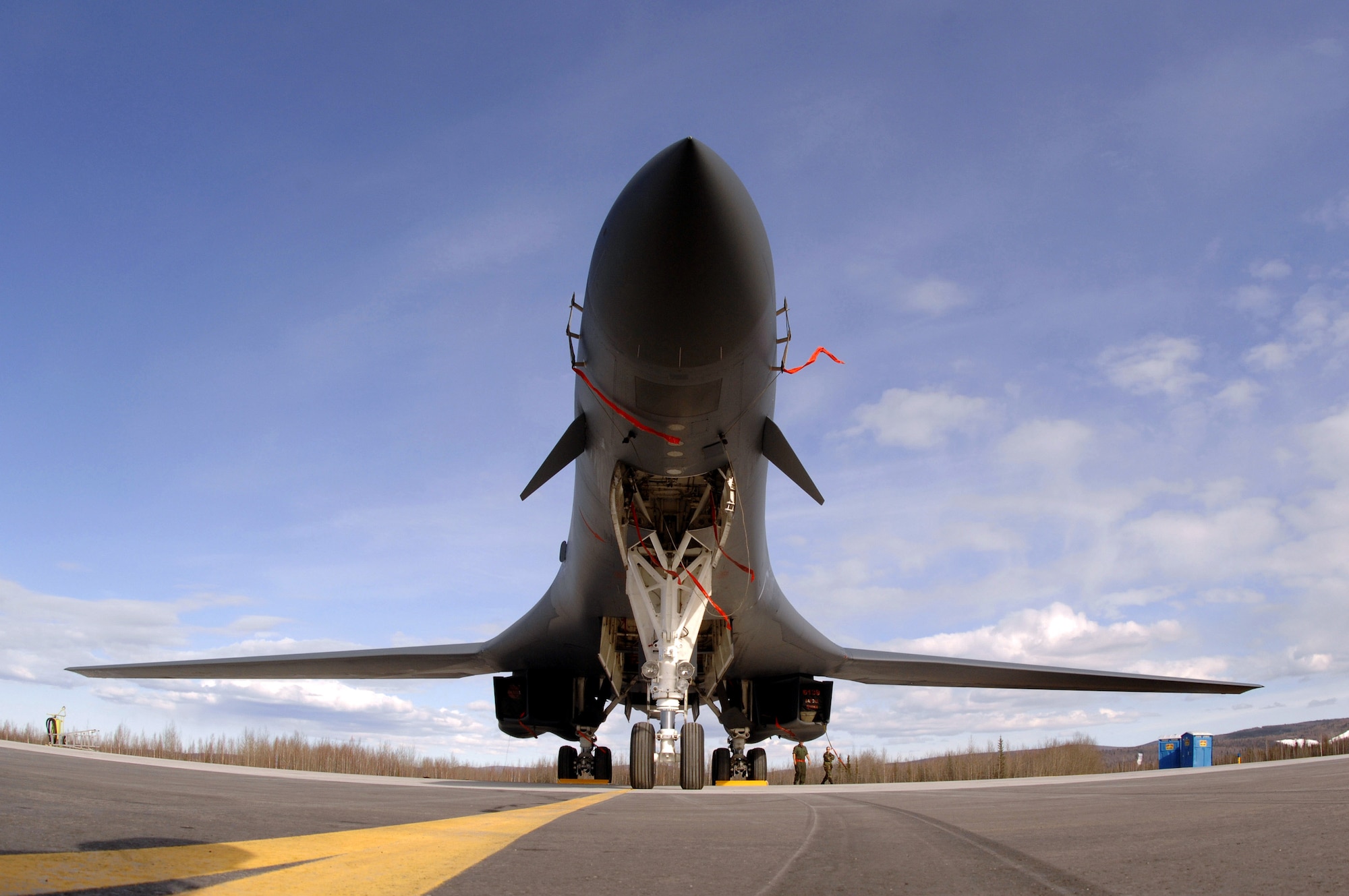 A B-1B Lancer from Ellsworth Air Force Base, S.D., sits on the flightline at Eielson Air Force Base, Alaska, April 9 during Red Flag-Alaska 07-1. Red Flag-Alaska enables aircrews to sharpen their combat skills by flying simulated combat sorties in a realistic threat environment. Additionally, the training allows them to exchange tactics, techniques, and procedures and improve interoperability. (U.S. Air Force photo/Staff Sgt. Joshua Strang) 