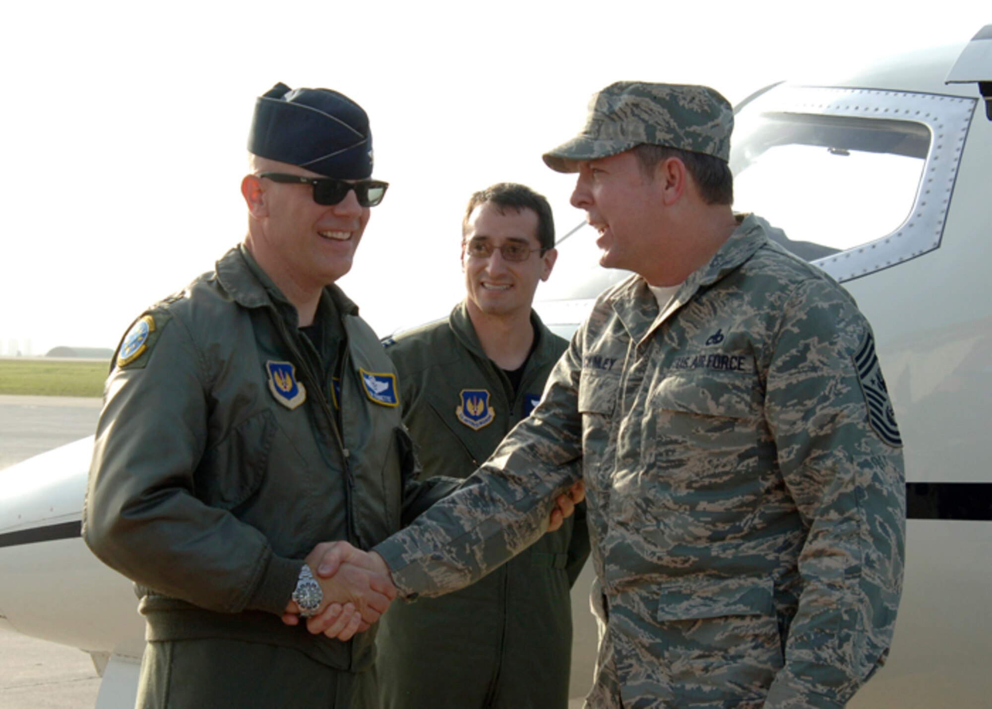 Colonel "Tip" Stinnette, 39th Air Base Wing commander, greets Chief Master Sgt. of the Air Force Rodney J. McKinley upon his arrival here April 7. (U.S. Air Force photo by Airman 1st Class Kelly LeGuillon)
