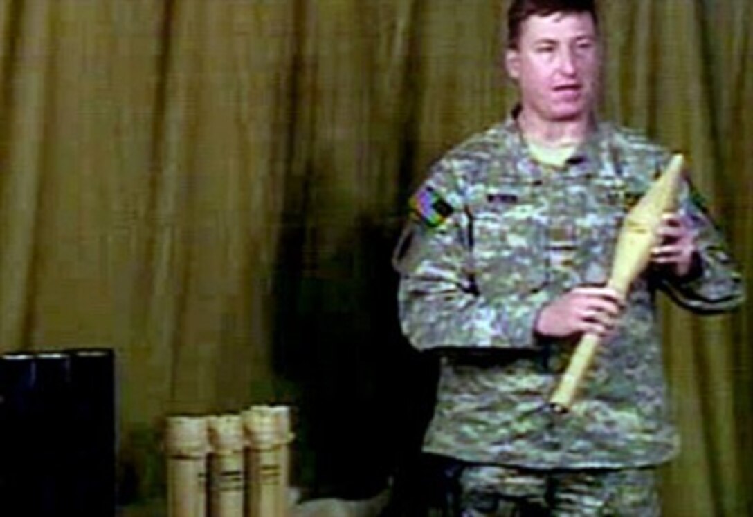 During an operations update from Iraq, April 11, 2007, Maj. Webber shows some of the weapons that were recently found in the back of a car in Baghdad. The Iranian weapons are dated 2005, 2006. An Iraqi gave Iraqi and coalition forces information about the weapons.
