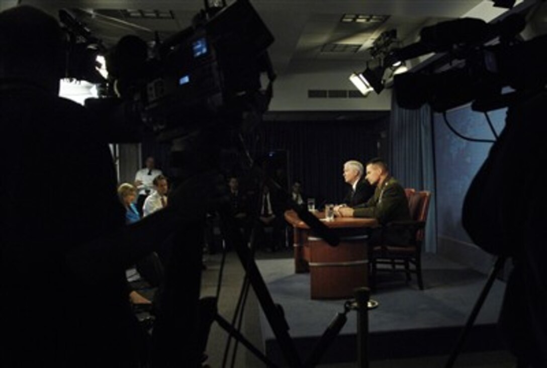 Defense Secretary Robert M. Gates and Chairman of the Joint Chiefs of Staff U.S. Marine Gen. Peter Pace conduct a press conference at the Pentagon, April 11, 2007.  