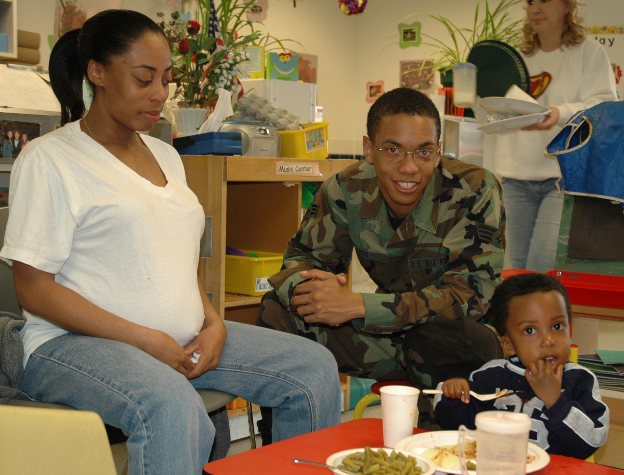 Senior Airman Anson Orr, 22nd Comptroller Squadron, and his wife Adina, join their son Anson, 2, at the Child Development Center April 11 for the Annual Month of the Military Child luncheon.  (Air Force photo by Tech. Sgt. Genevieve Morris 22nd ARW Public Affairs)