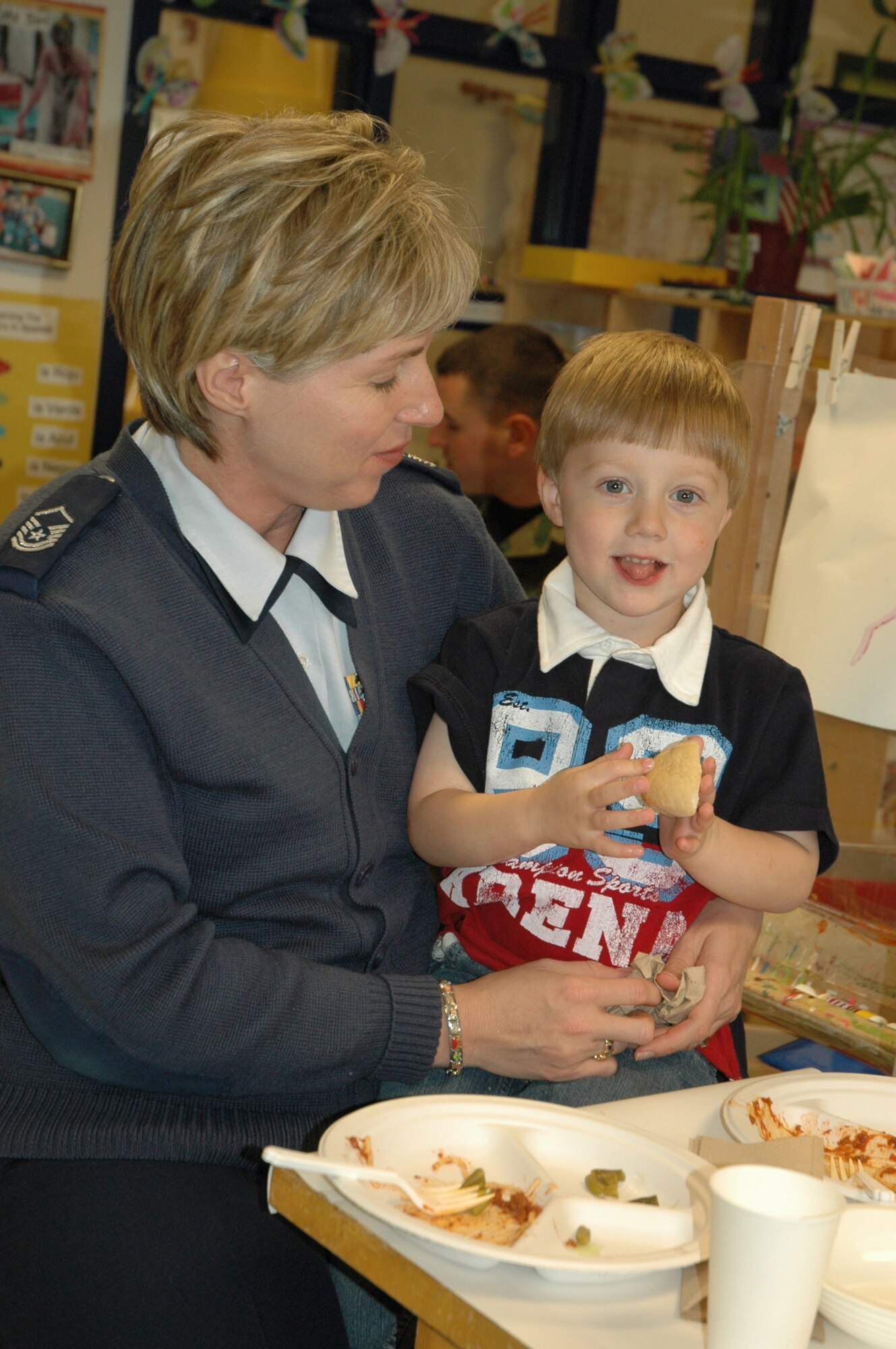 Master Sgt. Barbara Dalton, 22nd Mission Suport Squadron, joins her son Carson, 3, at the Child Development Center April 11 for the Annual Month of the Military Child luncheon.  (Air Force photo by Tech. Sgt. Genevieve Morris 22nd ARW Public Affairs)