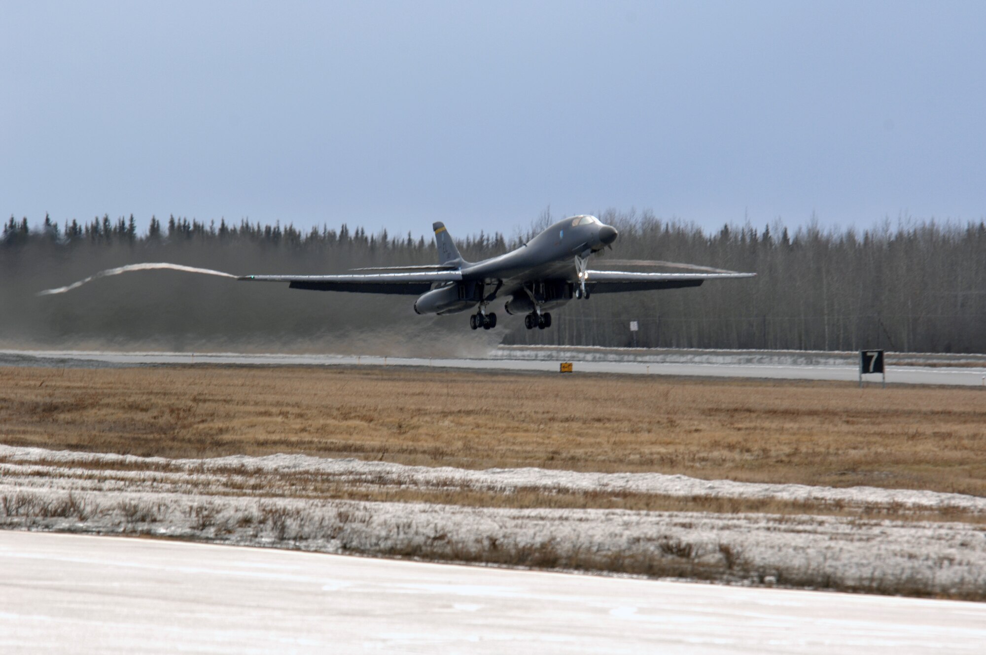 EIELSON AIR FORCE BASE, Alaska -- A B-1B Lancer, 28th Bomb Wing, Ellsworth Air Force Base, South Dakota  takes off for a mission during Red Flag-Alaska 07-1 here on April 11. Red Flag-Alaska is a Pacific Air Forces-directed field training exercise for U.S. forces flown under simulated air combat conditions. It is conducted on the Pacific Alaskan Range Complex with air operations flown out of Eielson and Elmendorf Air Force Bases. 
(U.S. Air Force Photo by Staff Sgt Joshua Strang) 