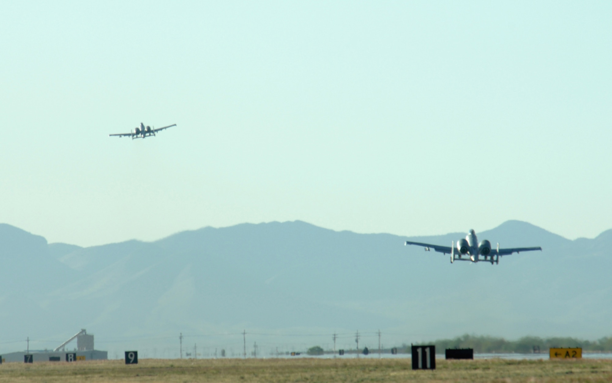 Two A-10 Thunderbolt II aircraft from the 354th Fighter Squadron here leave D-M and head for Afghanistan. Twelve pilots from the 354th FS left April 7, as part of a larger D-M deployment in support of Operation Enduring Freedom. (U.S. Air Force photo/Airman 1st Class Noah Johnson)