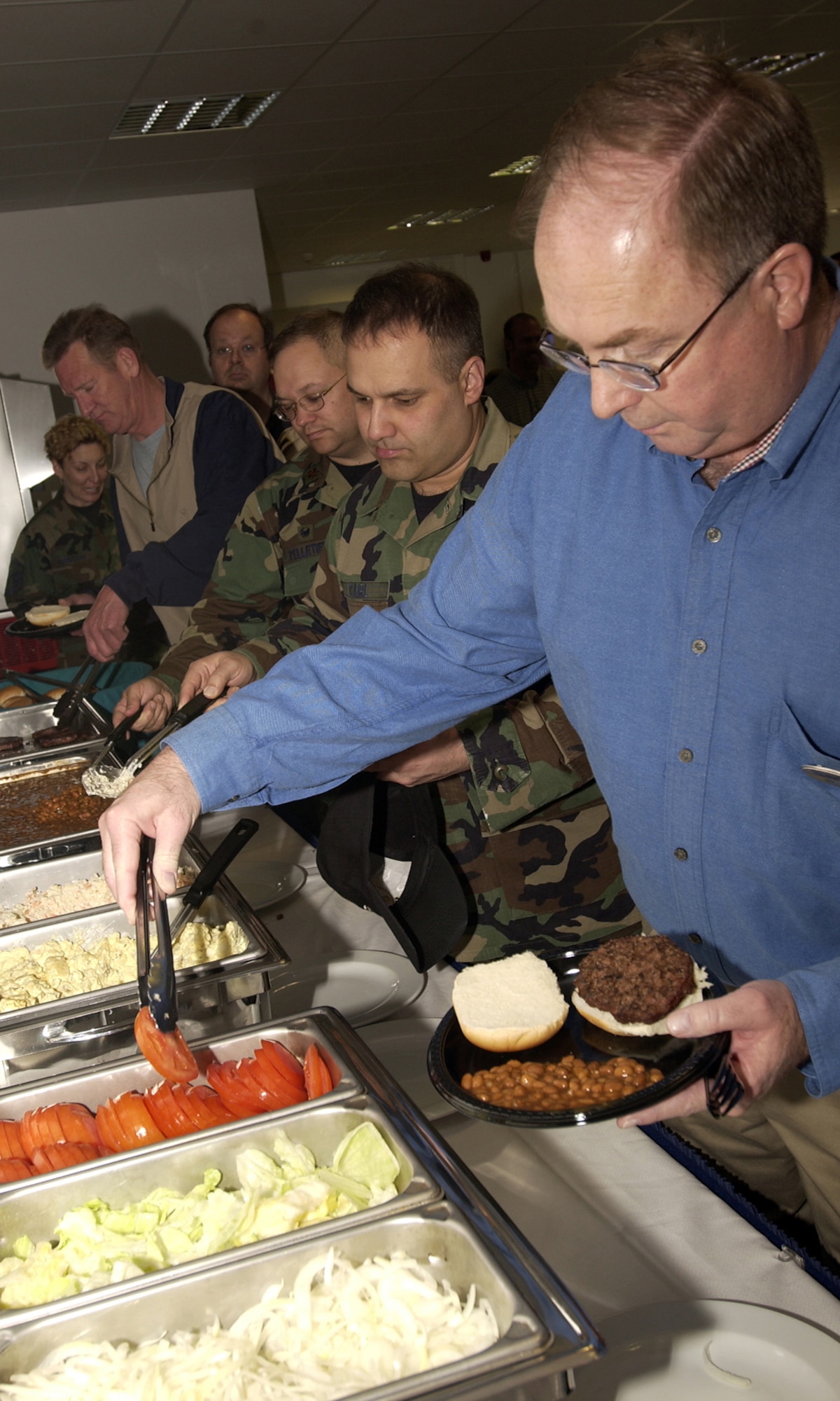 SPANGHDALEM AIR BASE, GERMANY -- After the Eifel Mountain Golf Course ribbon cutting ceremony guests were able to indulge in a buffet lunch in the newly re-opened dining area April 10.  (US Air Force photo/Staff Sgt. Ray Mills)