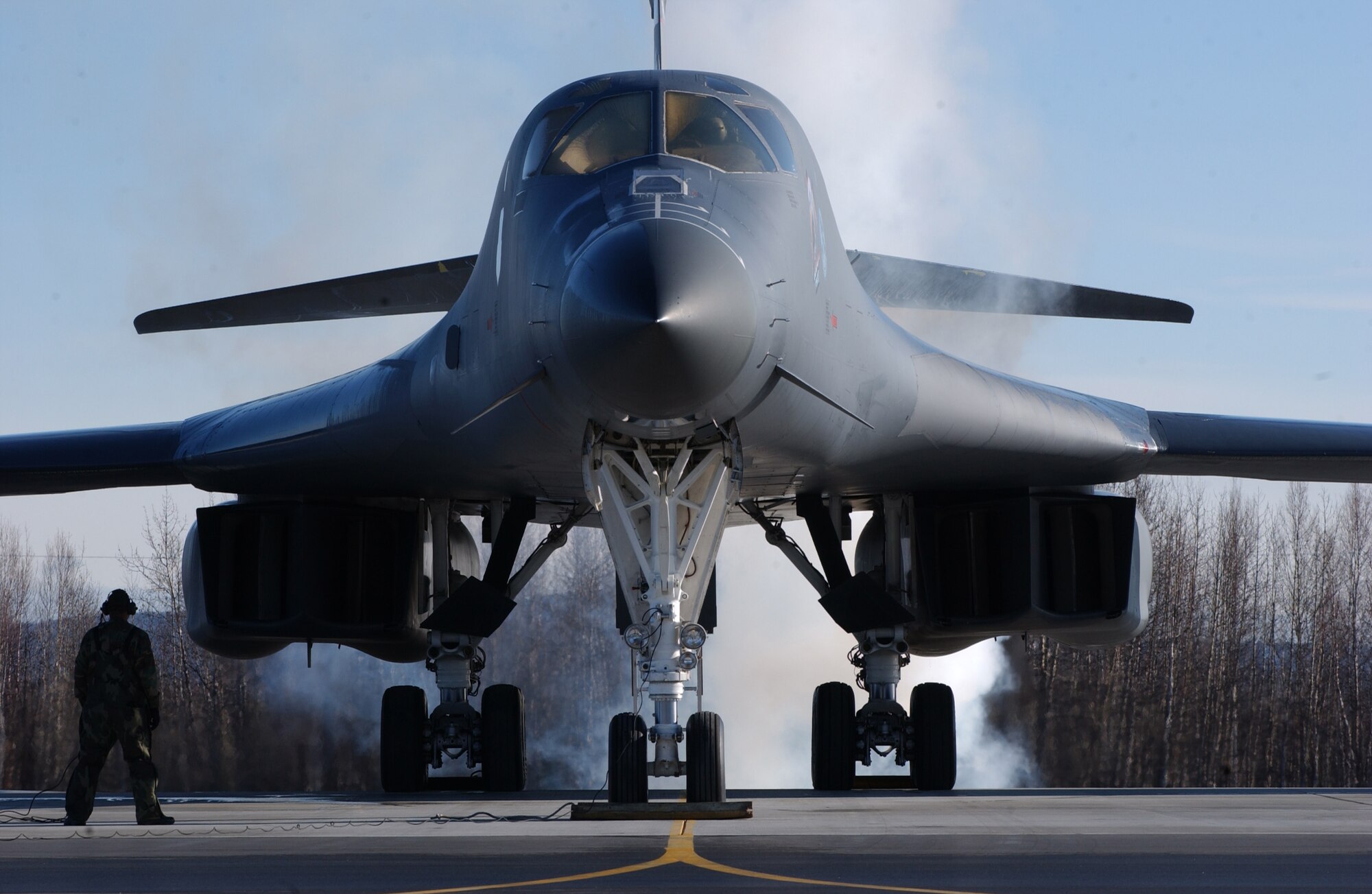 EIELSON AIR FORCE BASE, Alaska -- A B-1B Lancer, Ellsworth Air Force Base, S.D., starts its engine on April 13 during Red Flag-Alaska 07-1. Red Flag-Alaska is a Pacific Air Forces-directed field training exercise for U.S. forces flown under simulated air combat conditions. It is conducted on the Pacific Alaskan Range Complex with air operations flown out of Eielson and Elmendorf Air Force Bases. (U.S. Air Force Photo by Airman 1st Class Jonathan Snyder)