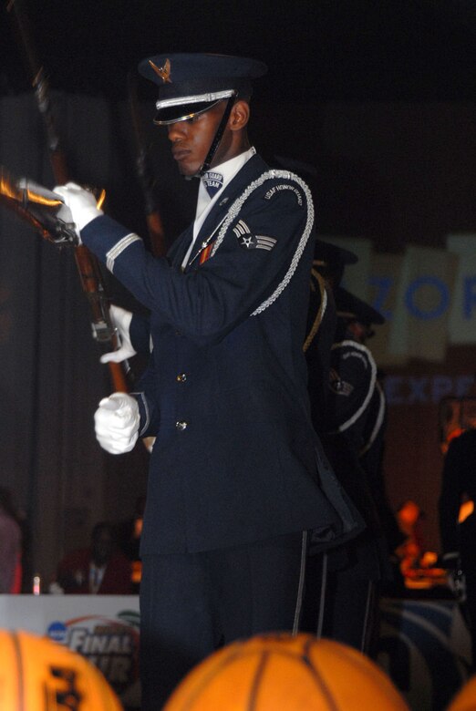 ATLANTA, Ga. -- Senior Airman Jermaine James, Air Force Honor Guard Drill Team member, performs at the RazorGator experience for fans attending the NCAA Final Four Games March 31.  The Air Force Honor Guard Drill Team was invited to perform for various ceremonies associated with the NCAA Final Four events March 31 - April 2, including the opening ceremonies at Centennial Olympic Park March 31.