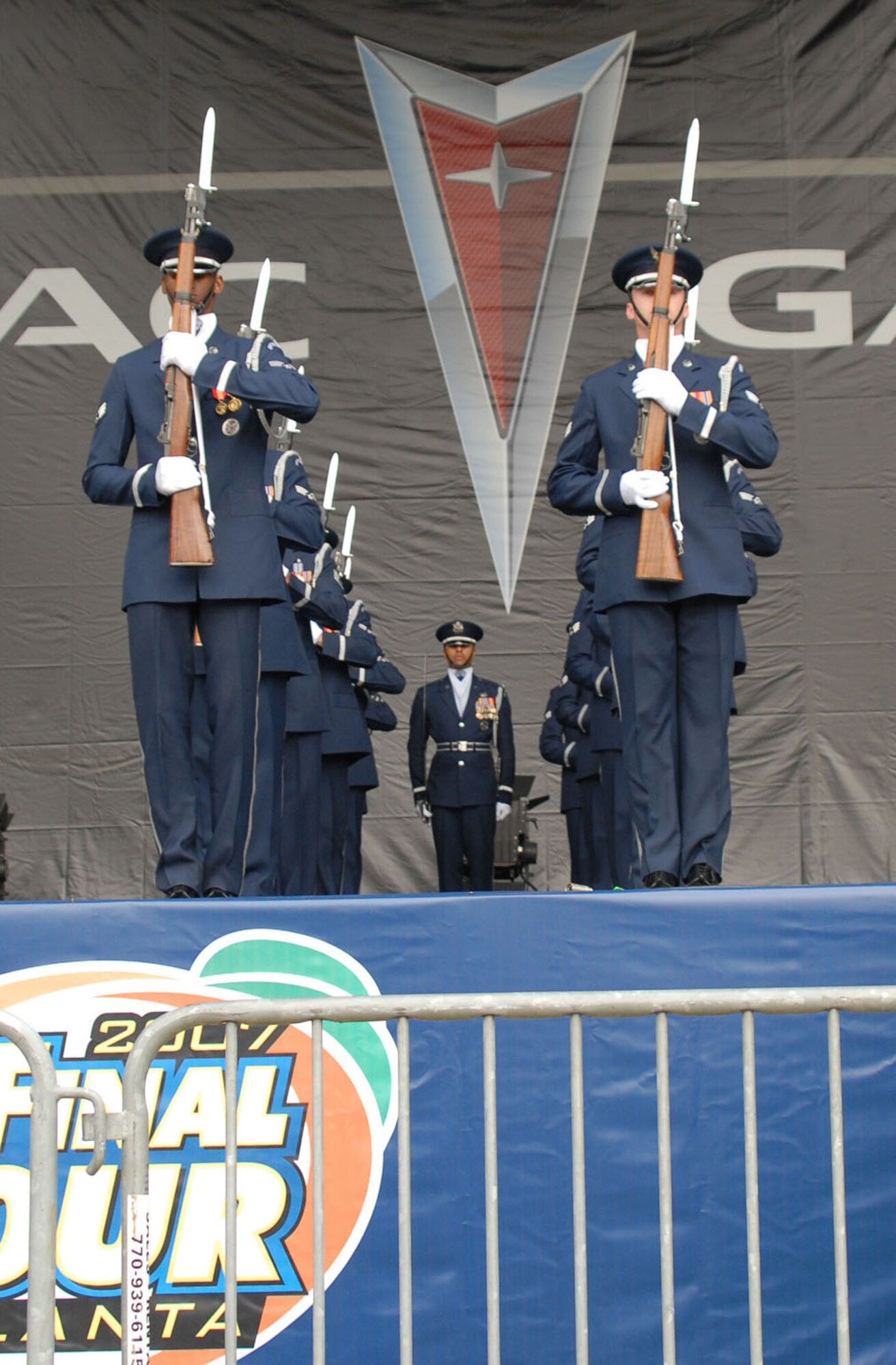 ATLANTA, Ga. -- Air Force Honor Guard Drill Team members perform at the opening ceremonies for the NCAA Final Four games at Centennial Olympic Park March 31.  The drill team was invited to perform at events and ceremonies surrounding the Final Four Games March 31 - April 2.