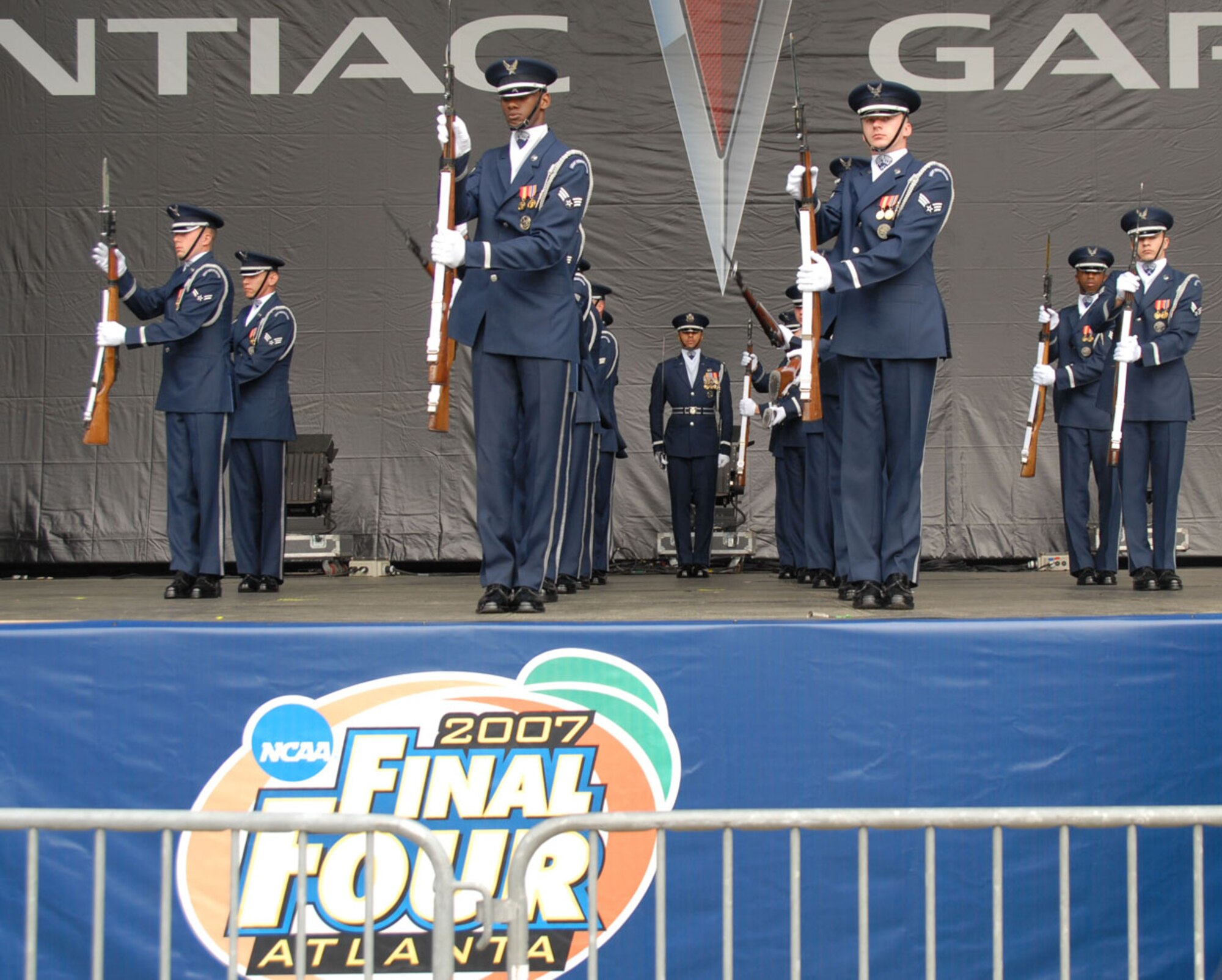 ATLANTA -- Air Force Honor Guard Drill Team members perform at the opening ceremonies for the NCAA Final Four Games March 31 at Centennial Olympic Park.The Air Force Honor Guard Drill Team was invited to perform for various ceremonies associated with the NCAA Final Four events March 31 - April 2, including Hoop City, an interactive experience for basketball fans.
