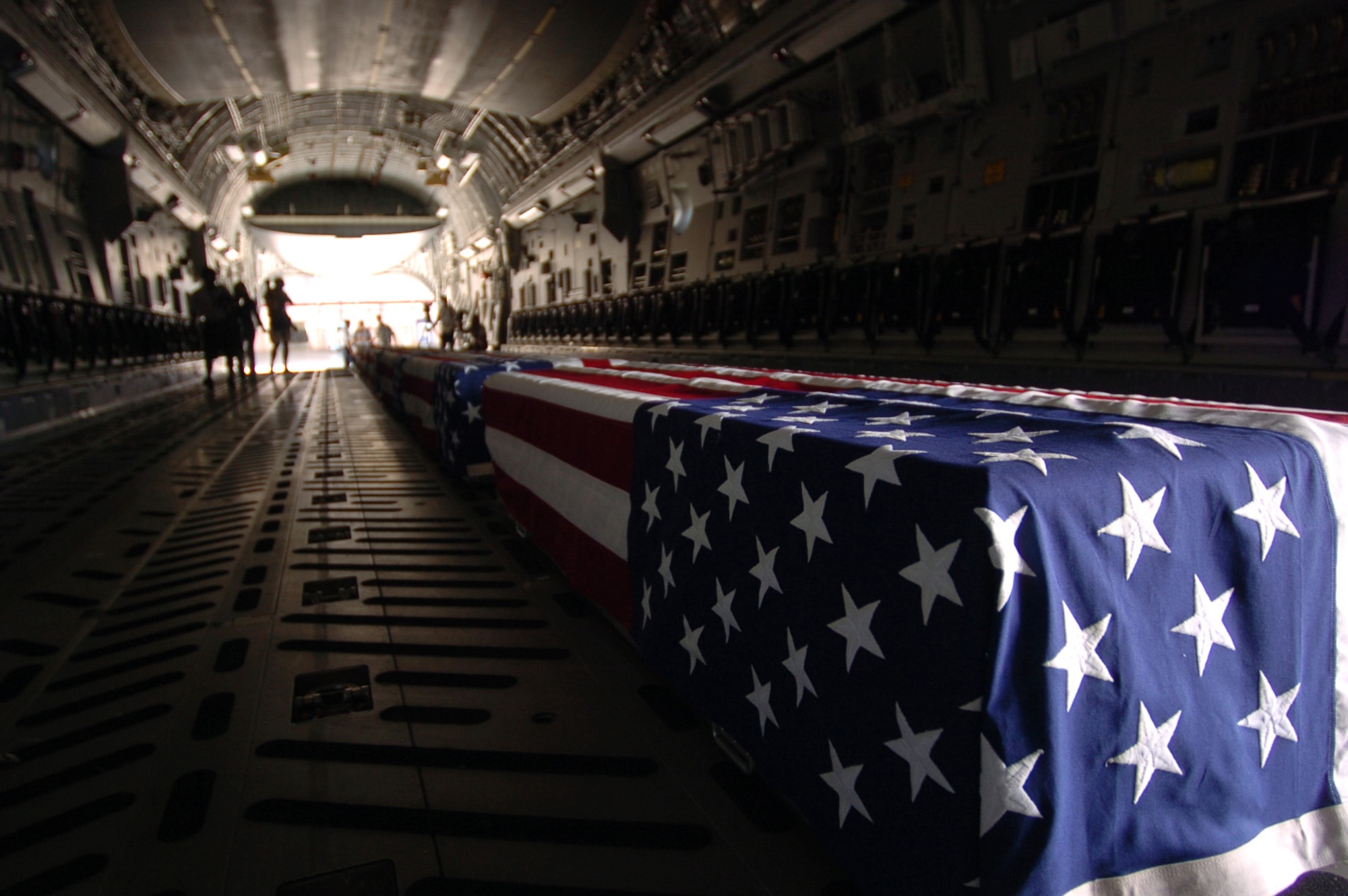 HICKAM AIR FORCE BASE, Hawaii -- A ceremony to honor the remains believed to be those of six U.S. service members lost during the Korean War marks their return to American soil at Hangar 35 on Hickam Air Force Base. The remains were turned over by North Korean officials to a U.S. delegation earlier this week.  (Air Force photo by Angela Elbern)