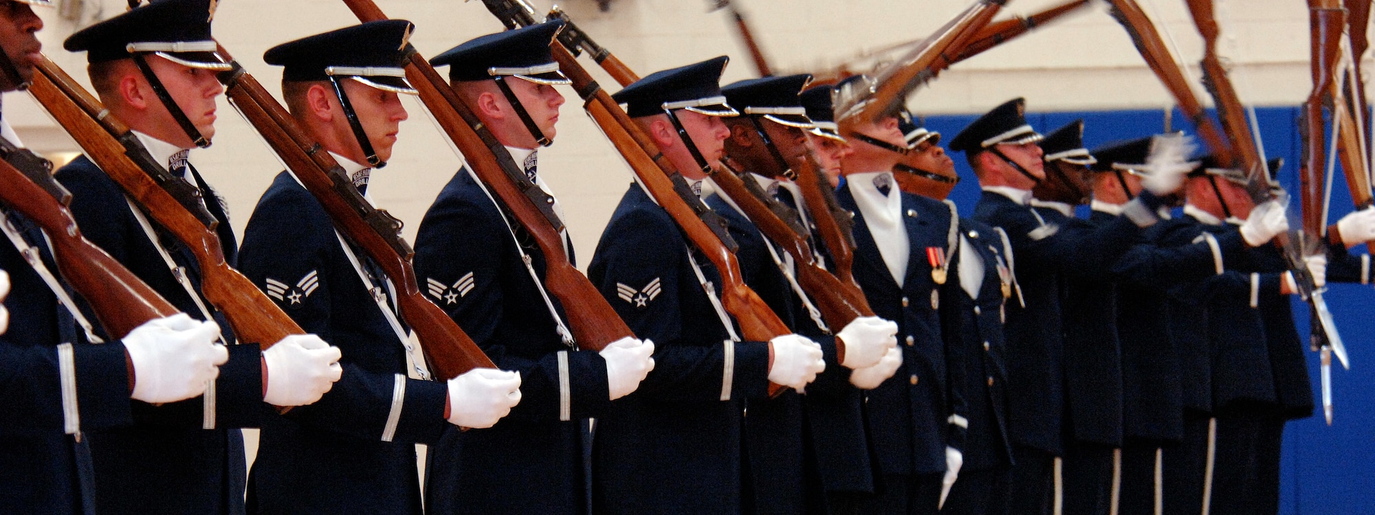 Members of the USAF Honor Guard Drill Team from Bolling AFB, Washington, D.C., showcase their rifle drill performance at Hill AFB's Hess Fitness Center April 3. The Drill Team promotes the Air Force mission by performing at public and military venues to recruit, retain and inspire airmen.