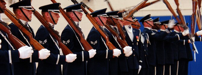 Members of the USAF Honor Guard Drill Team from Bolling AFB, Washington, D.C., showcase their rifle drill performance at Hill AFB's Hess Fitness Center April 3. The Drill Team promotes the Air Force mission by performing at public and military venues to recruit, retain and inspire airmen.