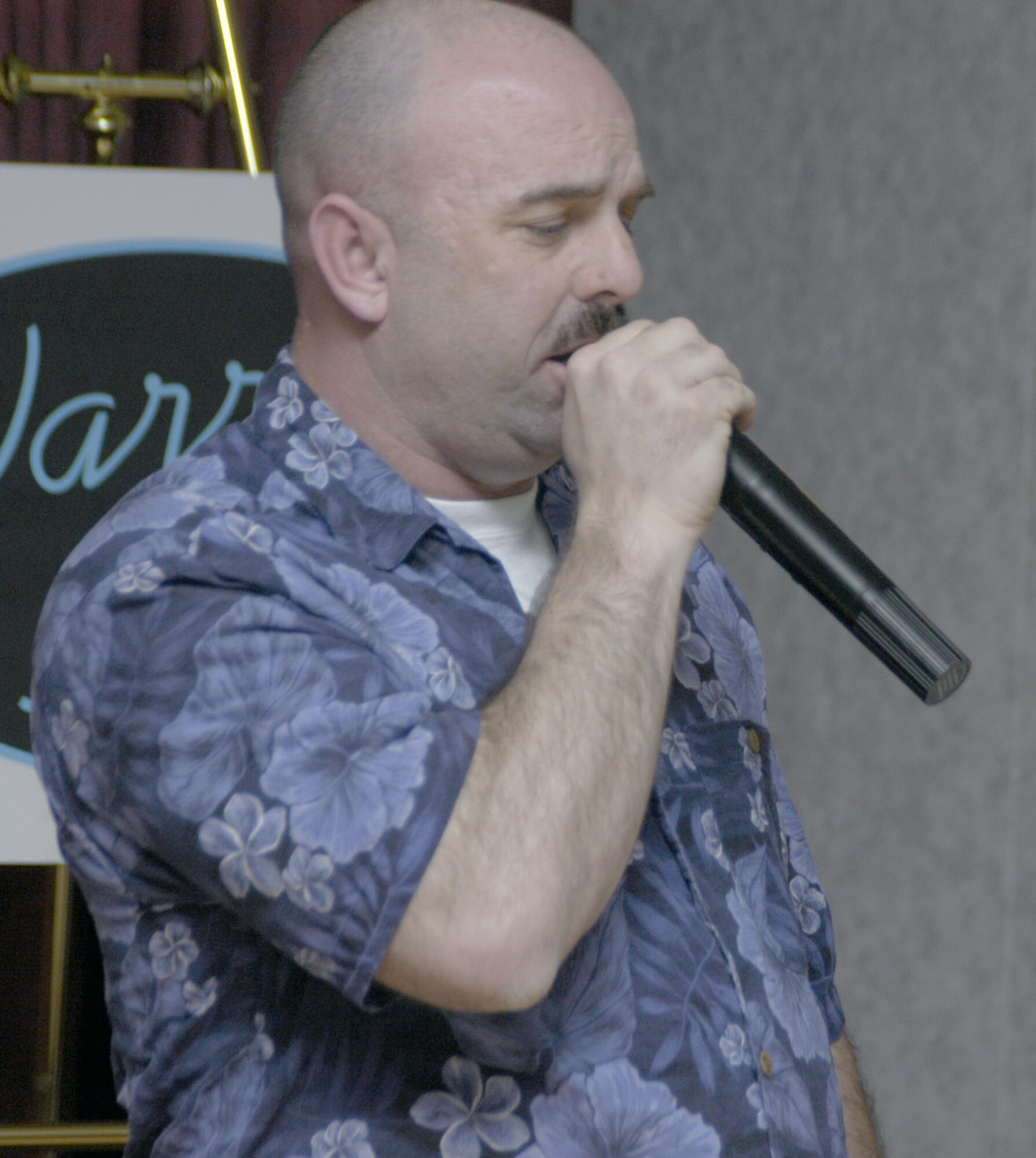 Capt. Mike Leonard, 321st Missile Squadron, came in third place in the competition. He sang "Brandy" by Looking Glass for his final song. The second and third place contestants received certificates as well and a services gift certificate for $10.