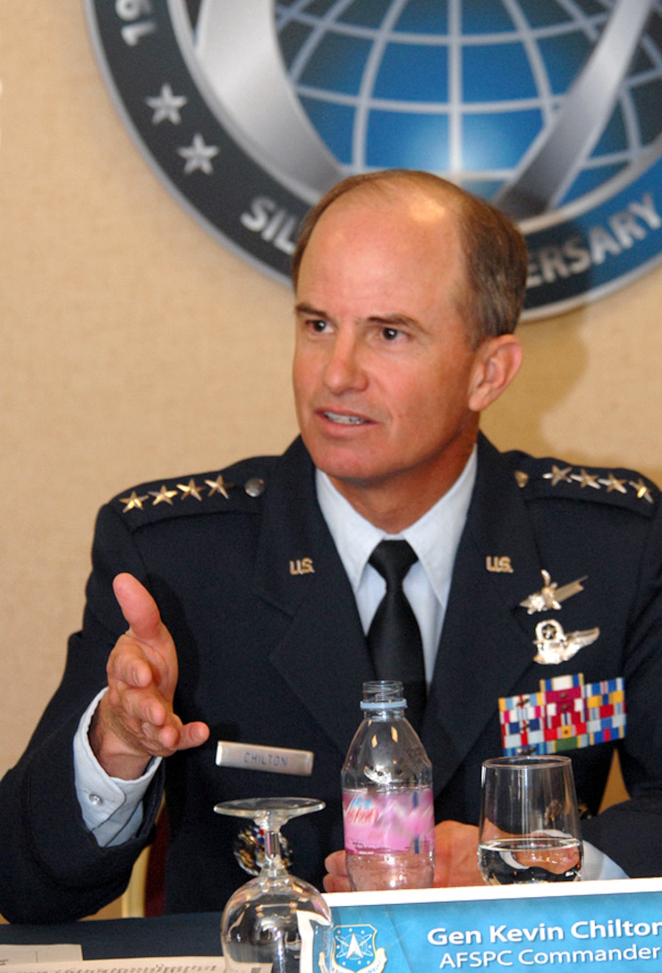 Gen. Kevin P. Chilton, Air Force Space Command commander, sits down with reporters April 12 after delivering remarks at the 23rd National Space Symposium in Colorado Springs, Colo.  At the symposium, General Chilton spoke to an audience of more than 500 military and civilian representatives about delivering space capabilities to the joint fight. (U.S. Air Force photo/Duncan Wood)