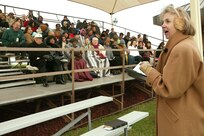 Chaplain (Maj.) Christy Sorrow delivers the Easter Sunrise Service April 8 at the parade ground on Lackland Air Force Base, Texas. More than 270 people filled the stands to hear the sermon, despite the 30-degree temperatures. Chaplain Sorrow is assigned to the 37th Training Wing as the deputy wing chaplain. (USAF photo by Robbin Cresswell)