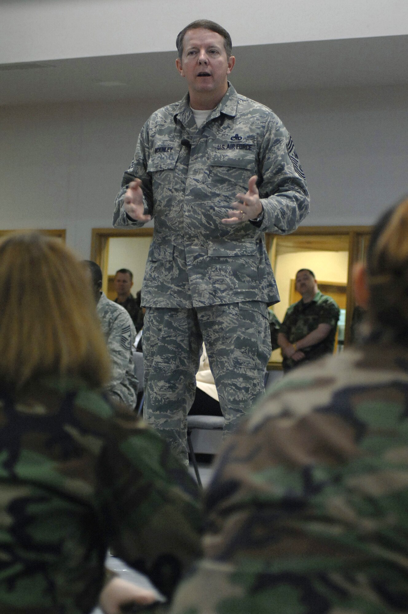 Chief Master Sgt. of the Air Force Rodney McKinley spoke during an enlisted call at RAF Mildenhall April 13. The chief talked to the Airmen about current events affecting the today’s Air Force, as well as addressed questions posed by the audience. (U.S. Air Force photo by Airman 1st Class Teresa Pumphrey)