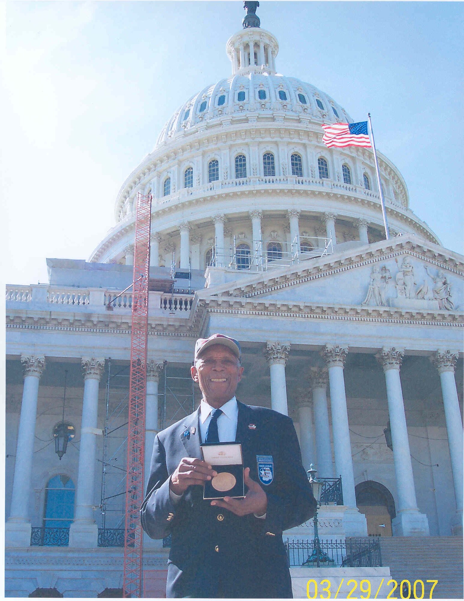 Tech. Sgt. (ret.) George Watson, original Tuskegee Airman, poses outside the U.S. Capitol Building after receiving the Congressional Gold Medal during a ceremony March 29. Mr. Watson was one of six Tuskegee Airmen to receive the medal. The Congressional Gold Medal is the most distinguished award bestowed by the United States Congress. It is the nation's top civilian award presented to those individuals that embody the best quality in America's Heritage. Before it can be awarded, legislation must be approved by Congress and signed into law by the President. Congress first awarded the Congressional Gold Medal to George Washington in 1776.
