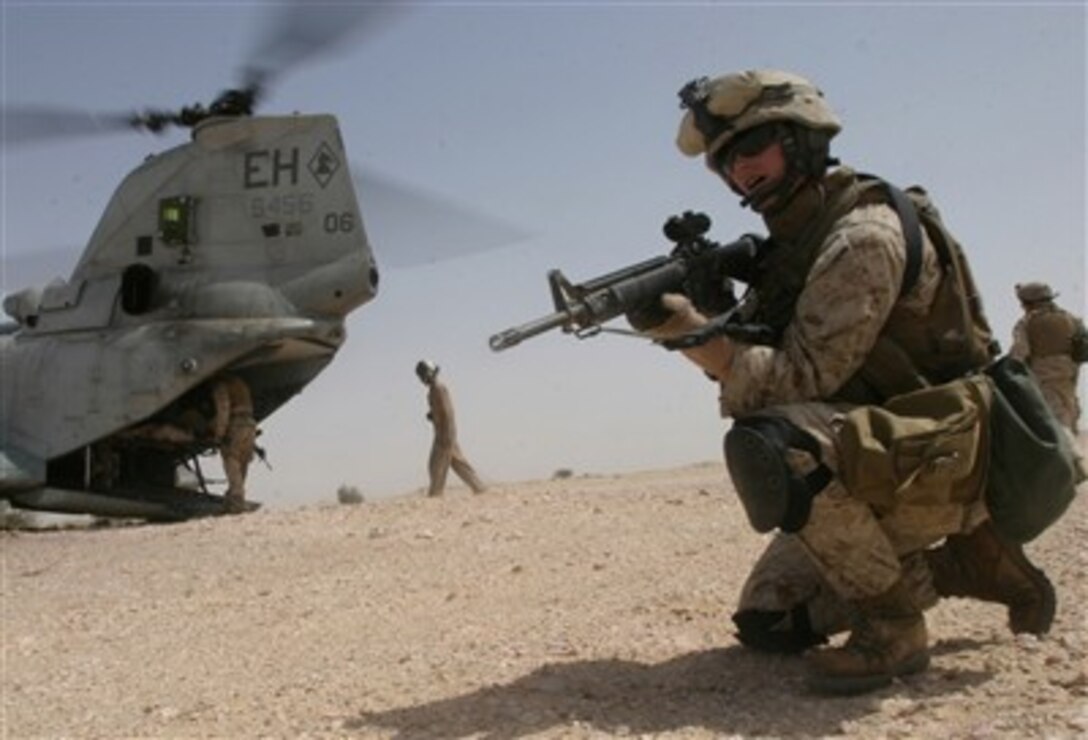 Cpl. William J. McMonigle, a squad leader from Company F, Battalion Landing Team 2/2, provides security for a simulated casualty evacuation during a company-wide training evolution ashore in the Middle East, April 7, 2007. 